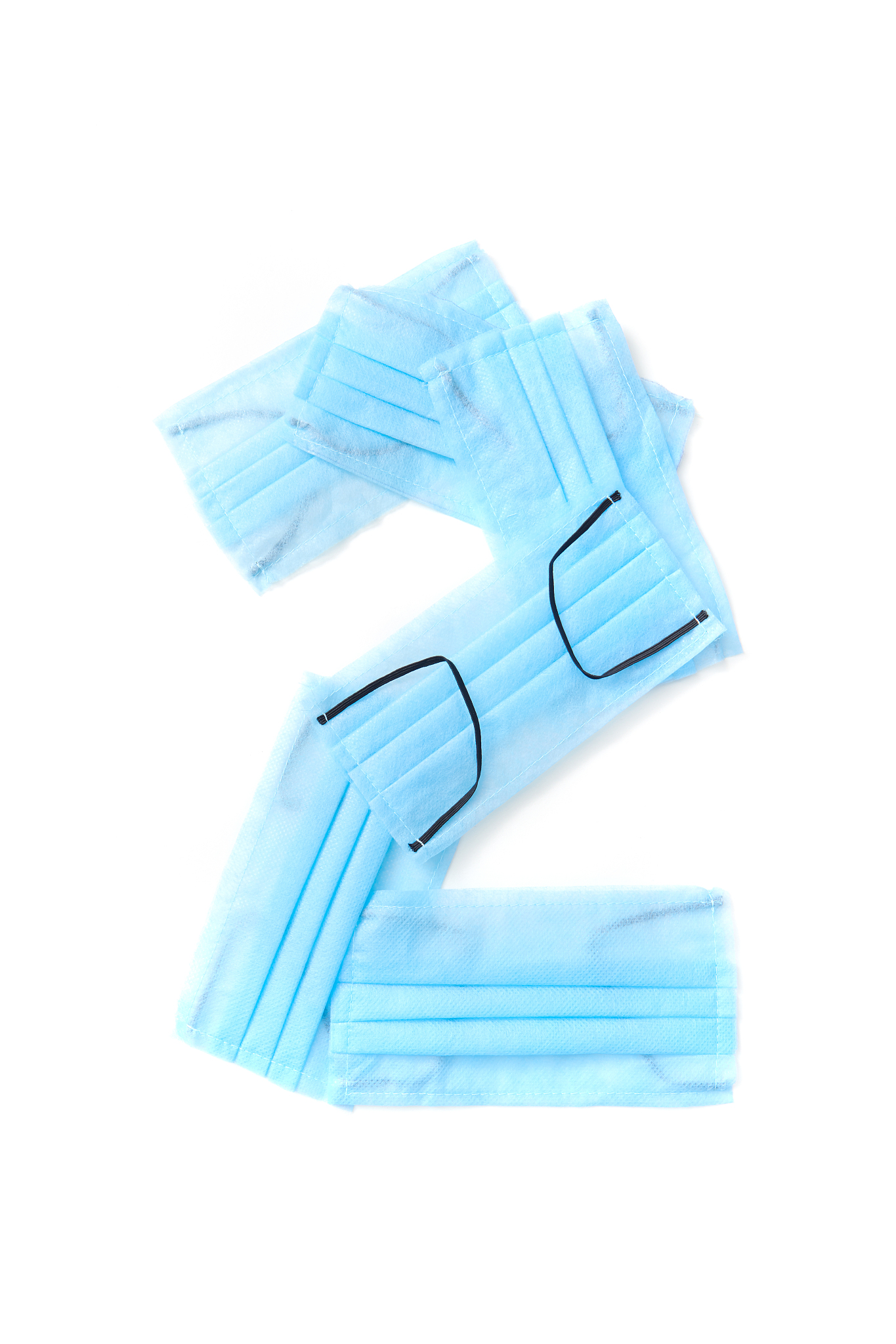 number two made from protective medical masks on a white backgro