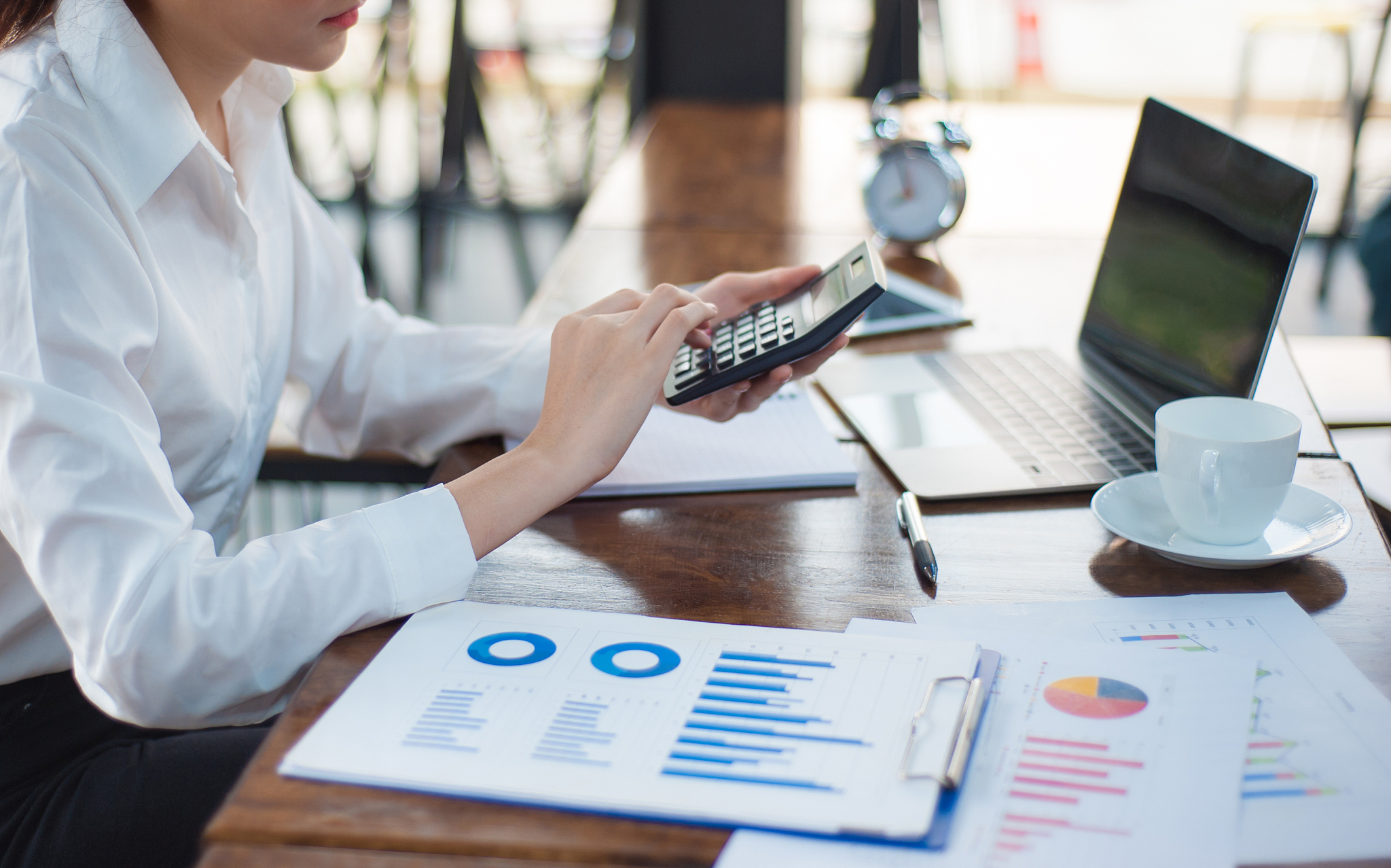 business women who are serious about analyzing business profits 