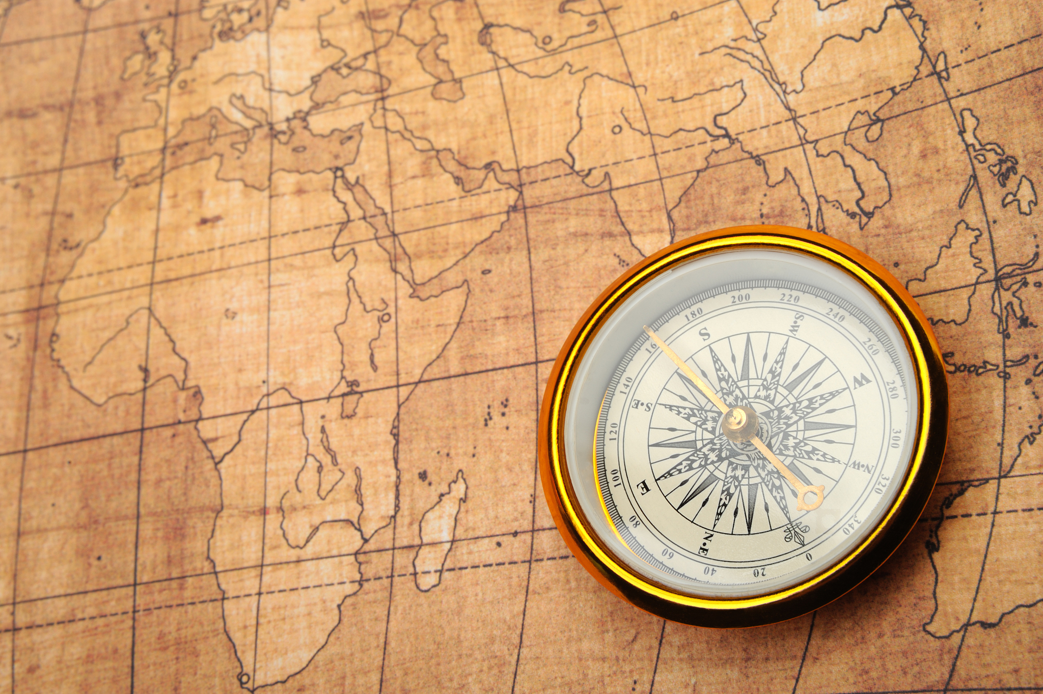 compass on old map.
