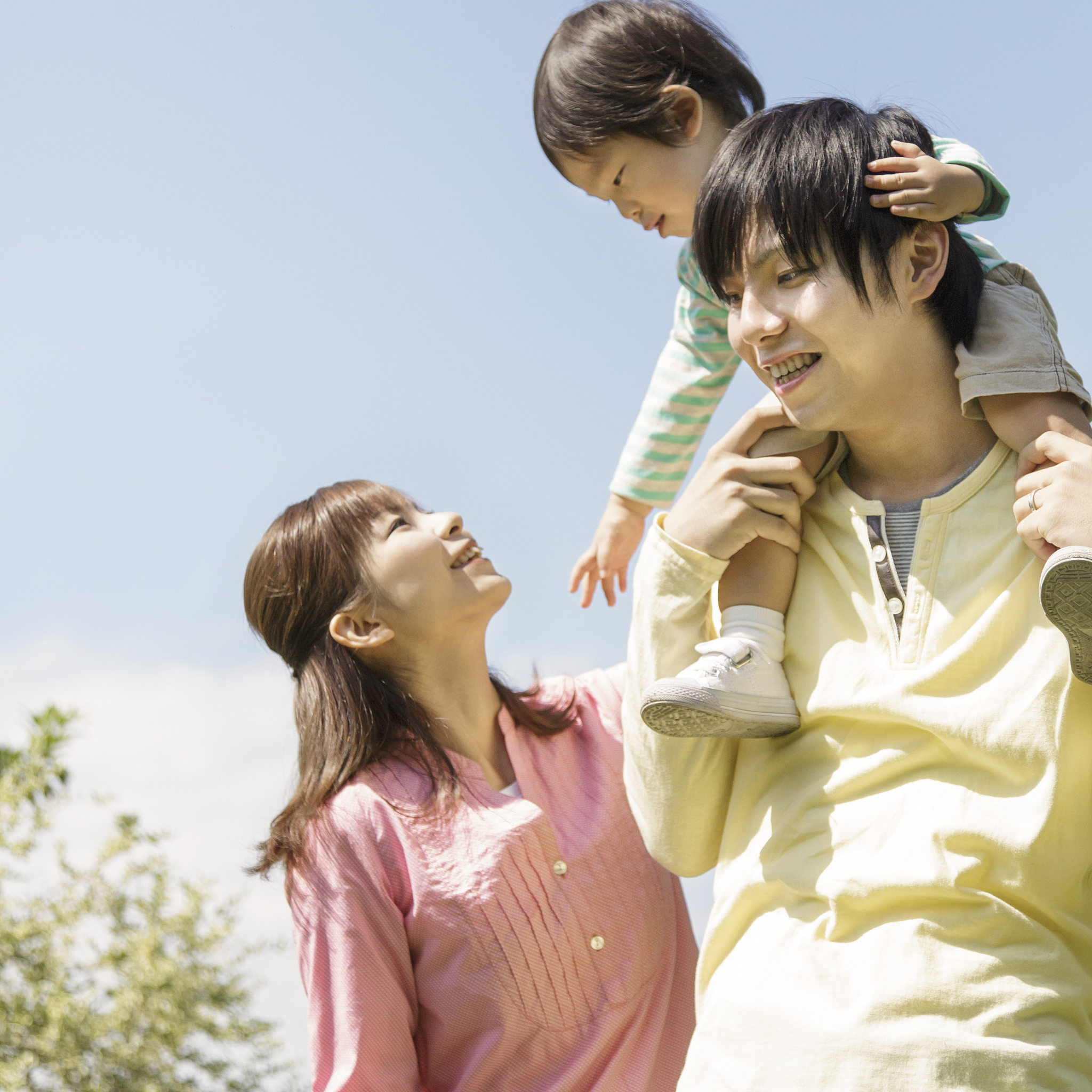 boy enjoying with his parents
