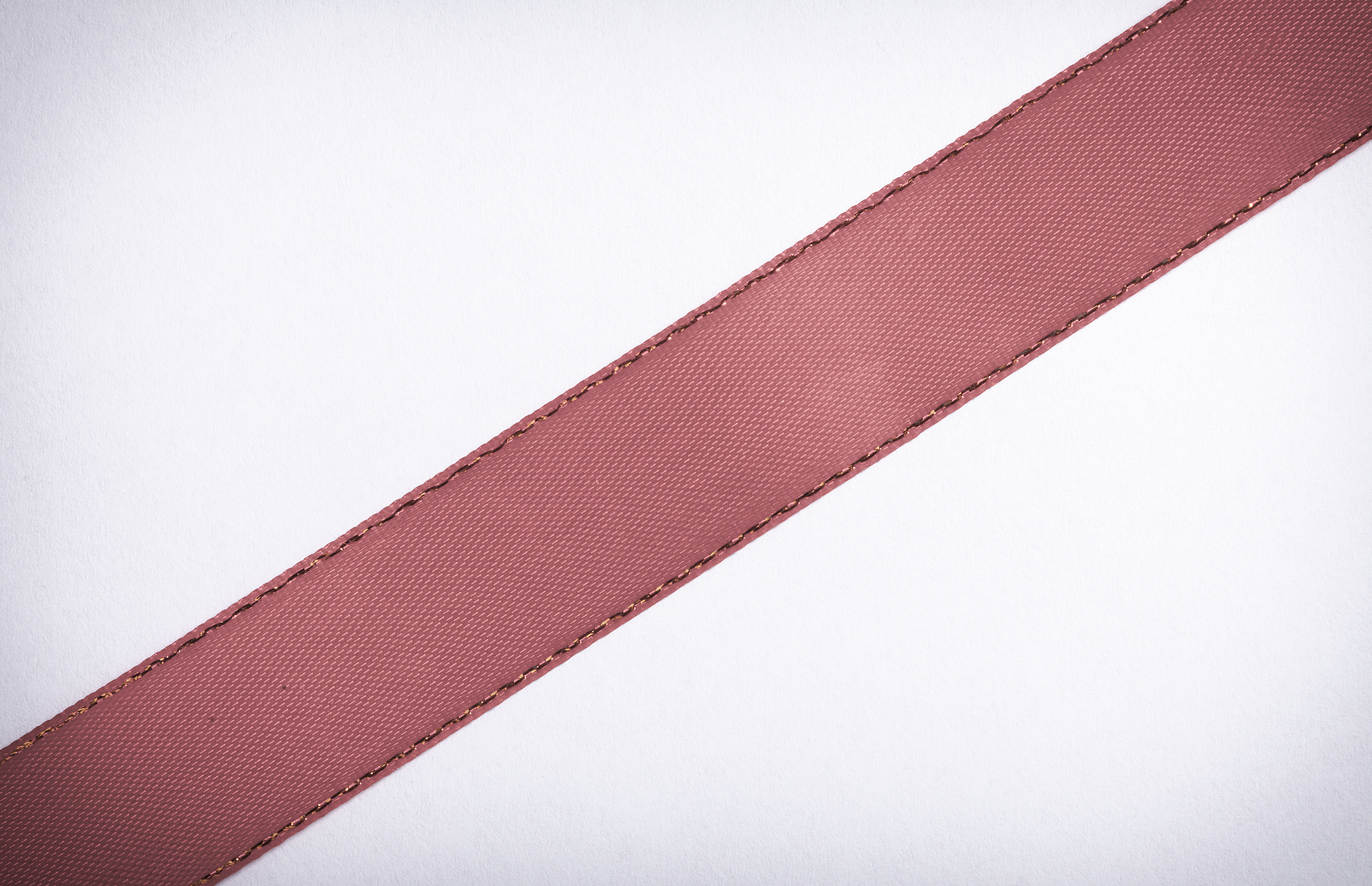 red ribbon on white background copy space