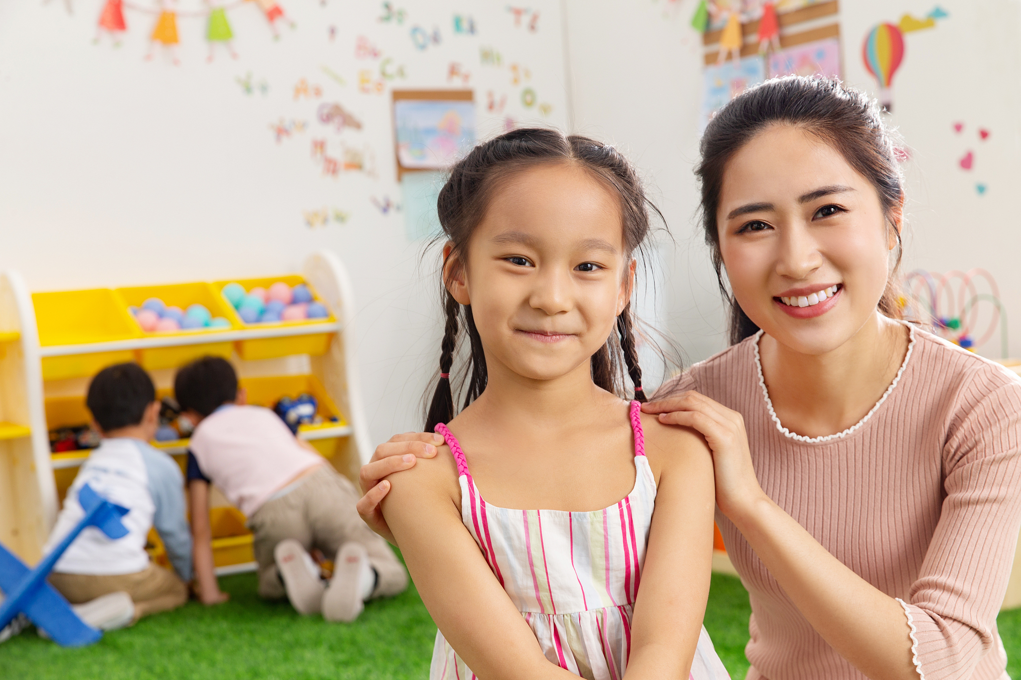 kindergarten teachers and the children