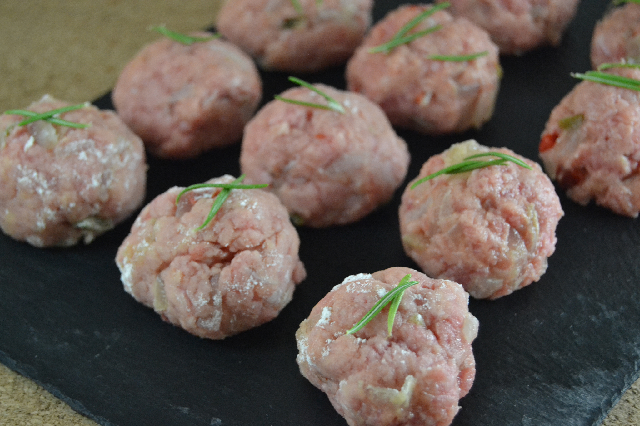 meatballs on a black dish