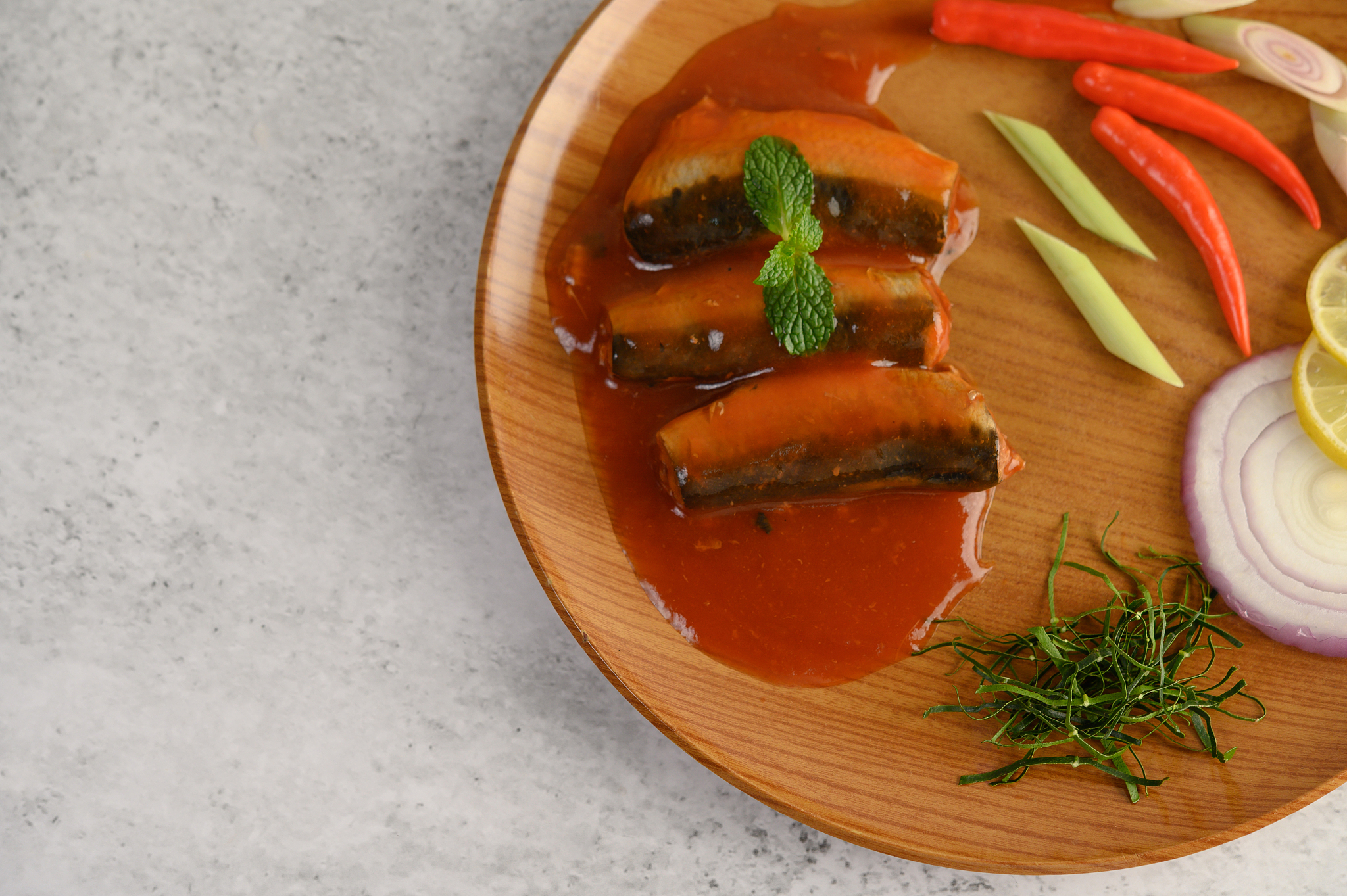 top view, selective focus canned sardine with tomato sauce peper