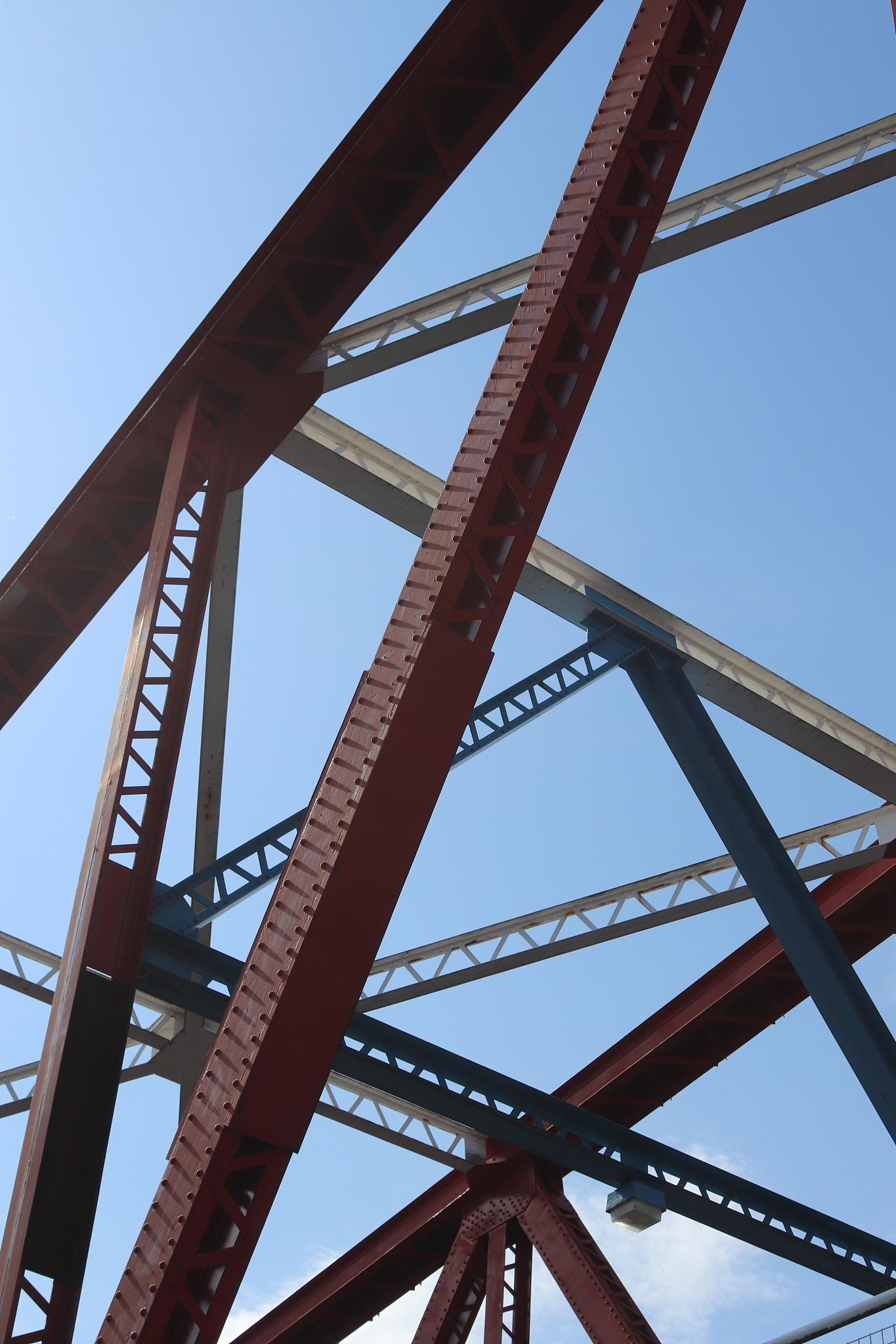 a man is 60 Kg a cow is 50kg and a bridge has a weight limit of 500 kg how is the man going to cross the bridge with the cow