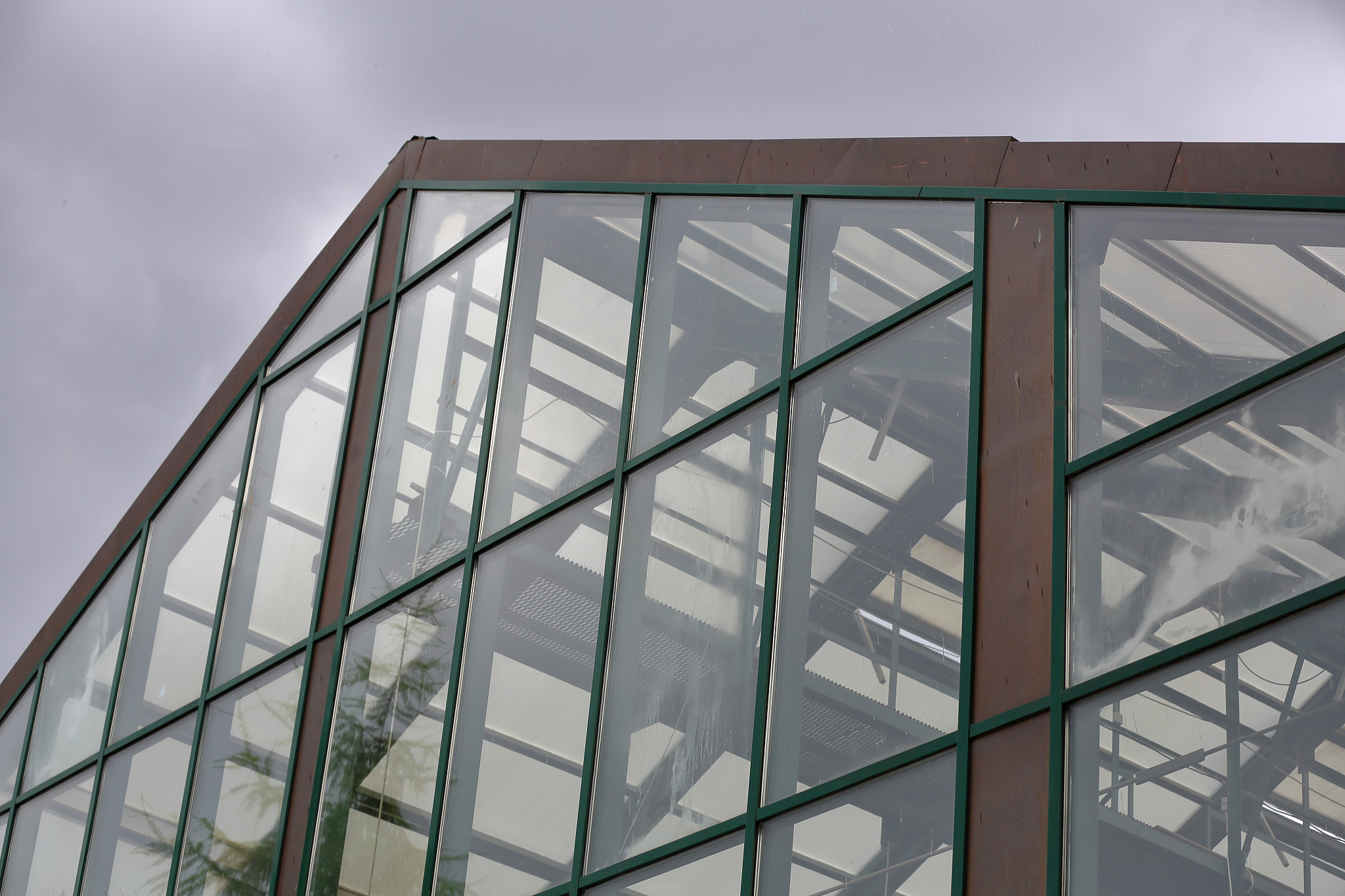 glass facade of the greenhouse for tropical plants