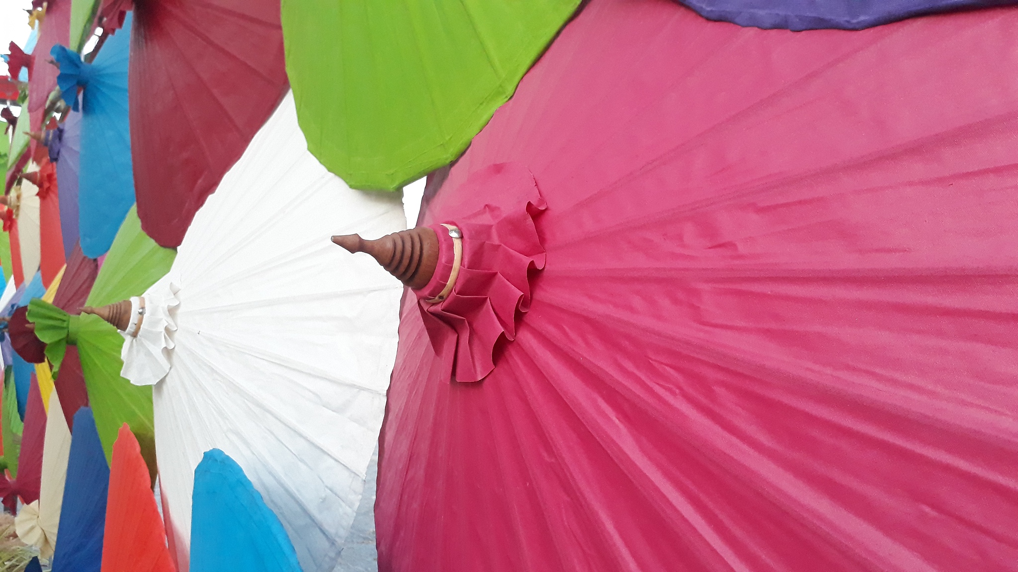 close-up of multi colored umbrellas
