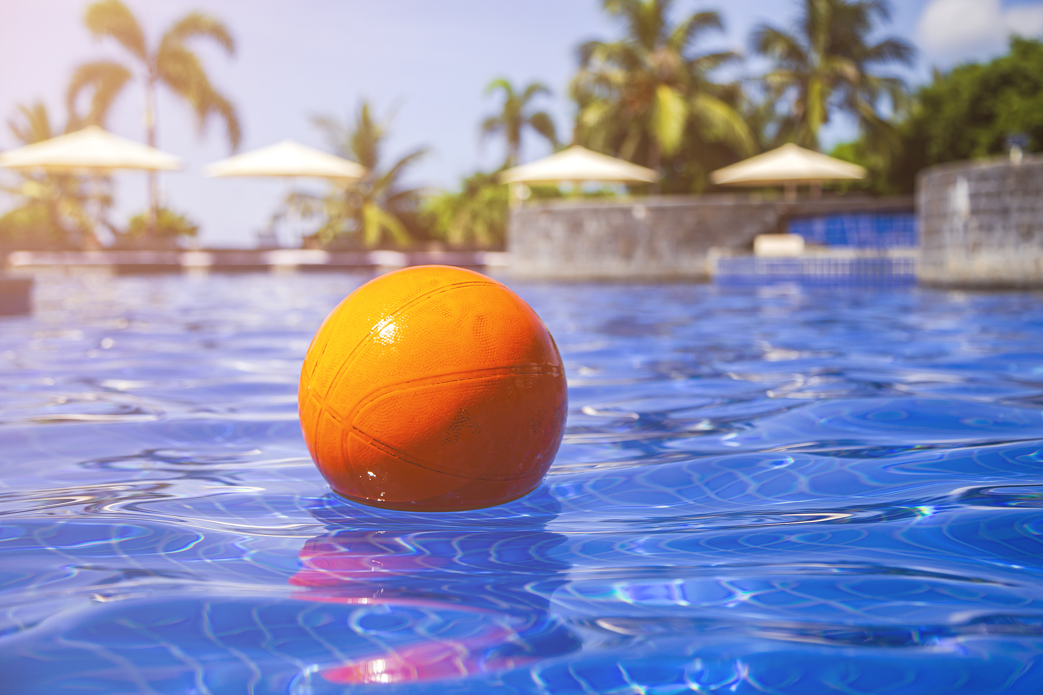 basketball in swimming pool water