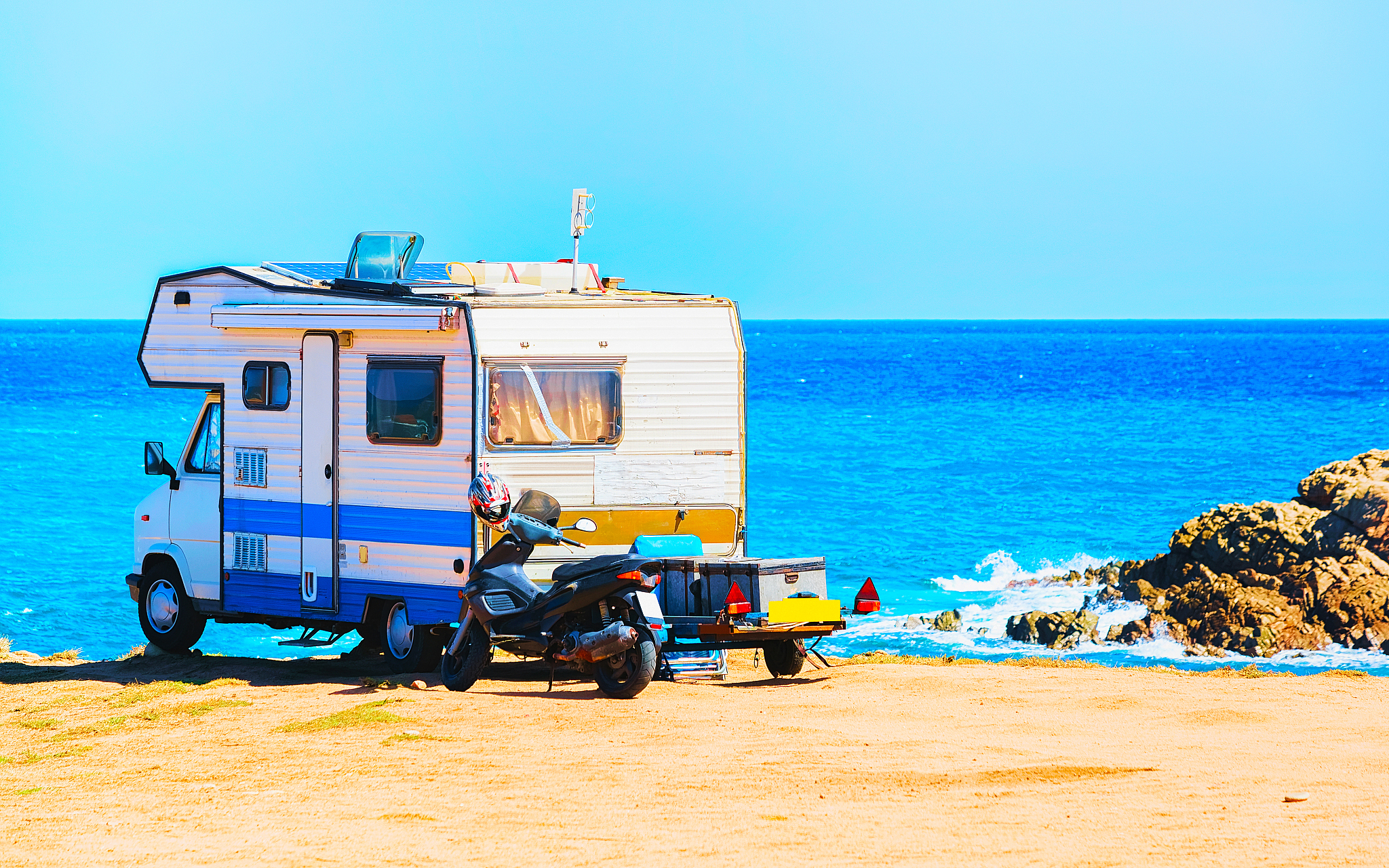 camper at capo pecora resort at mediterranean sea sardinia refle