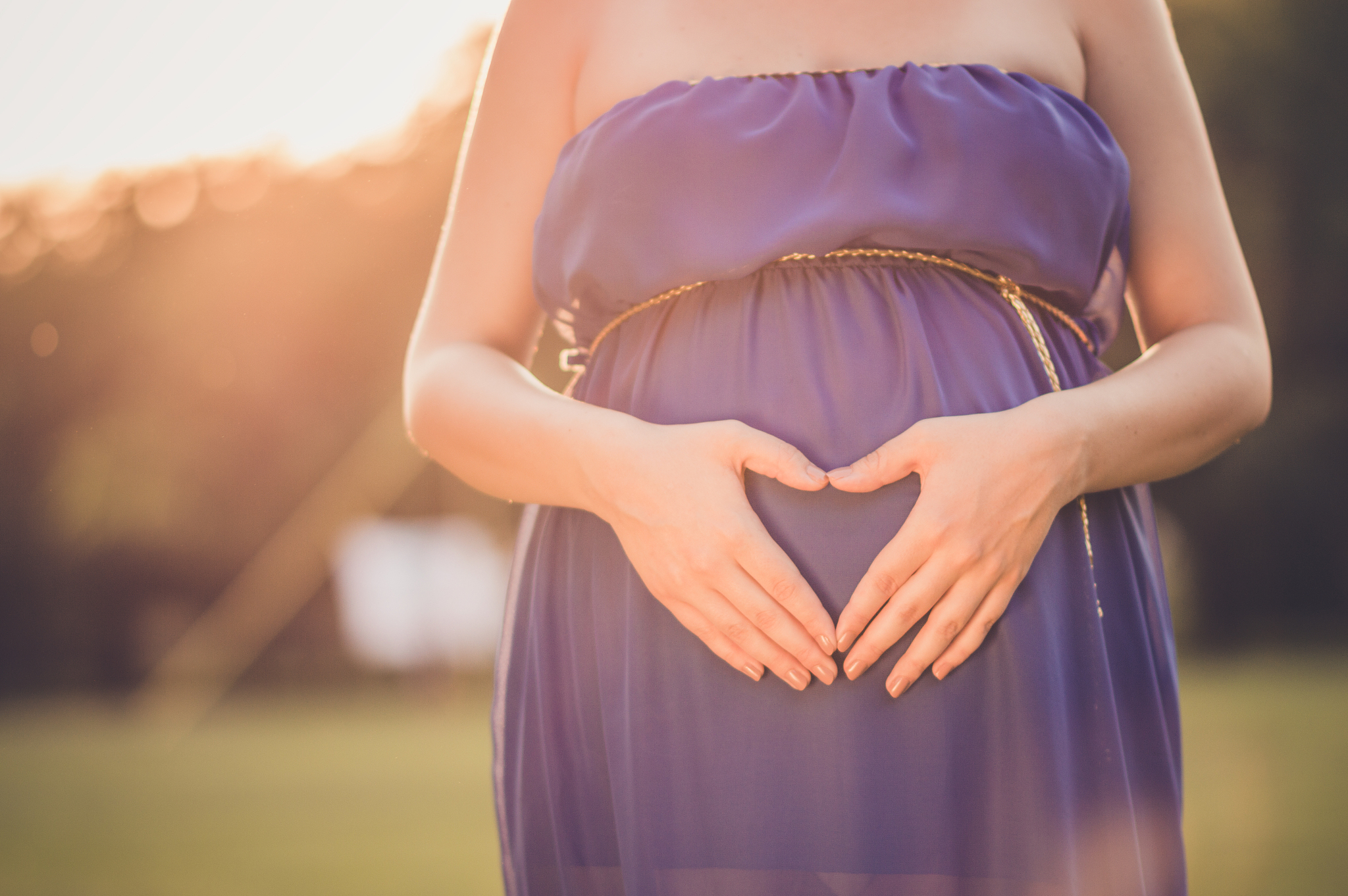 future mother at sunset