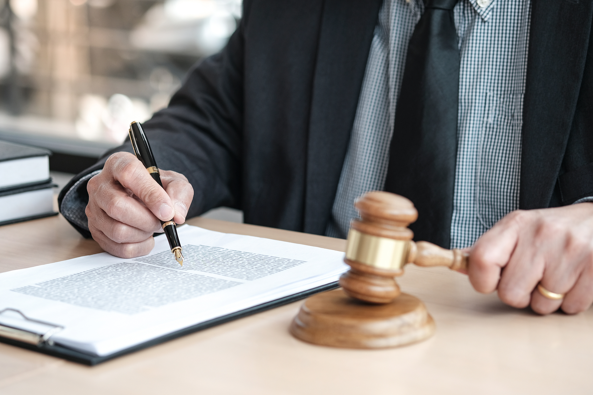 legal counsel presents to the client a signed contract with gave
