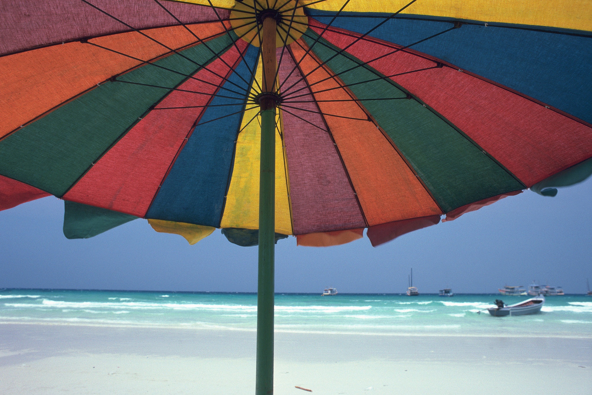 colorful beach umbrella, low angle view