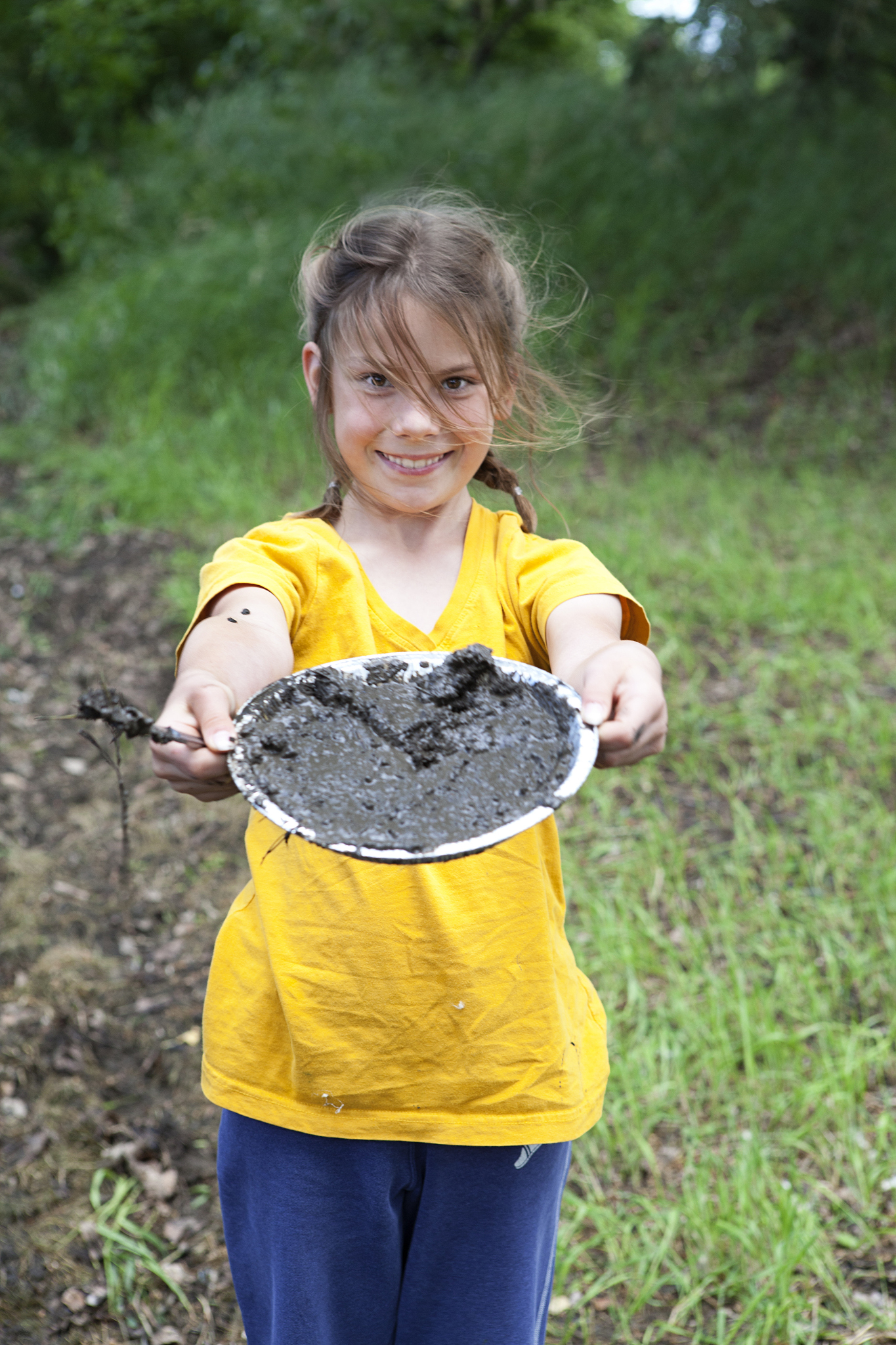 girl with mud pie