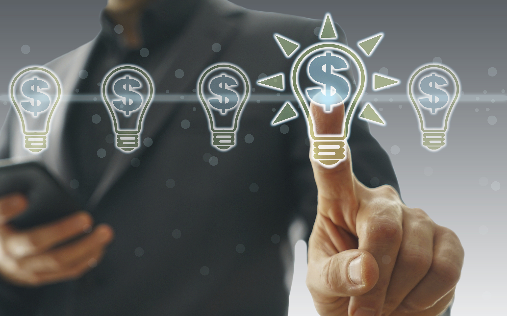 dollar concept with light bulbs on touch screen