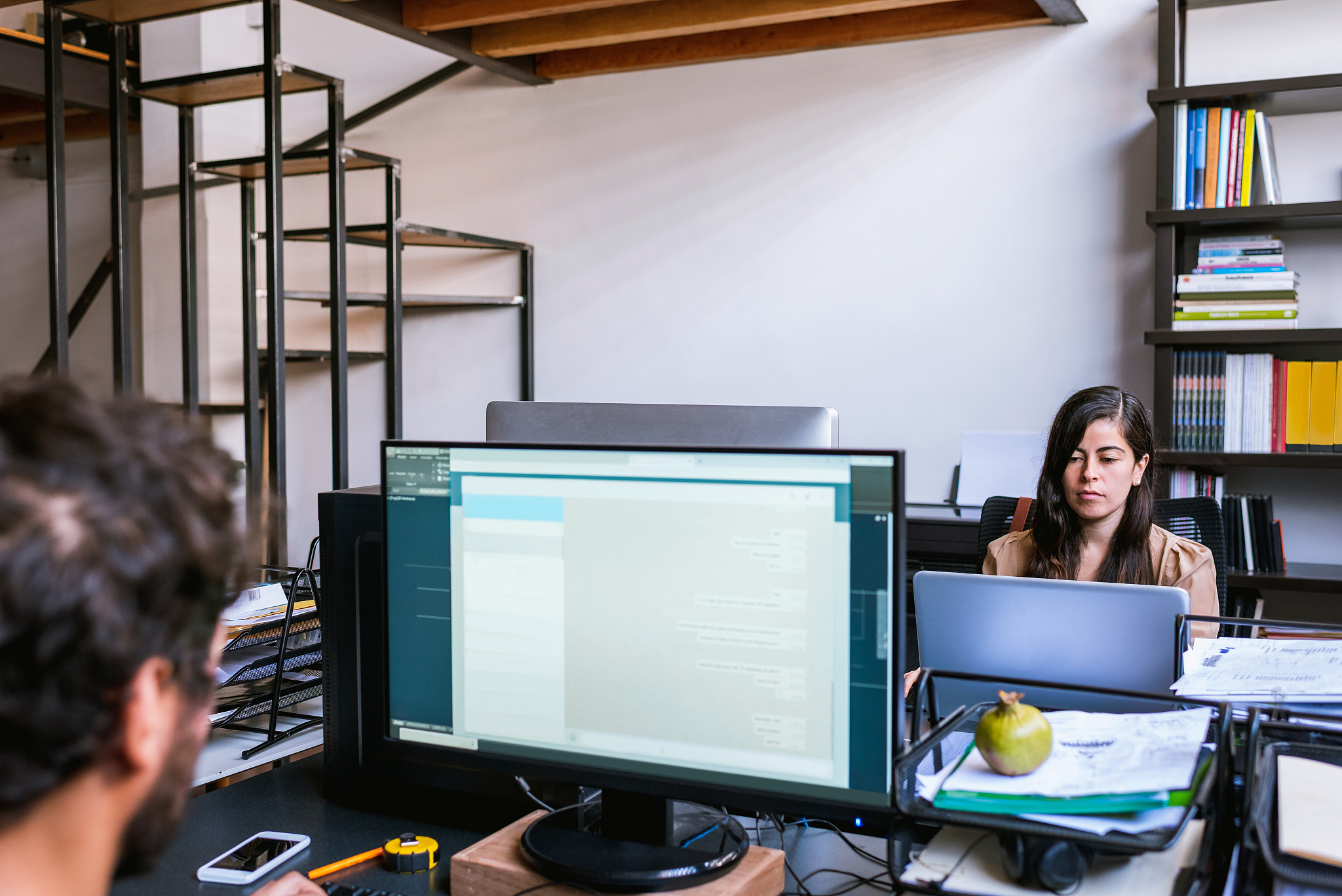 two architects working together in office