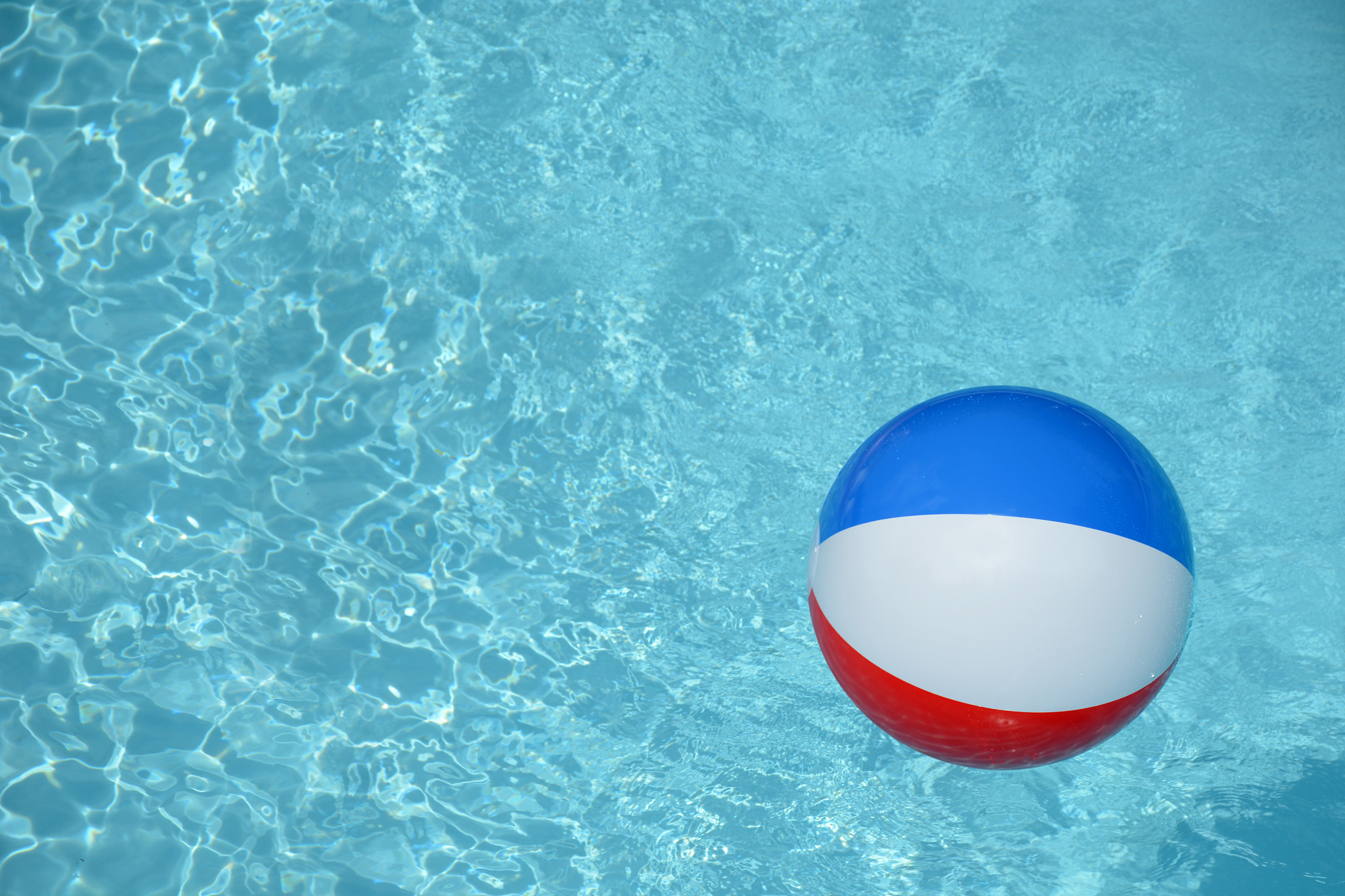 beach ball in swimming pool