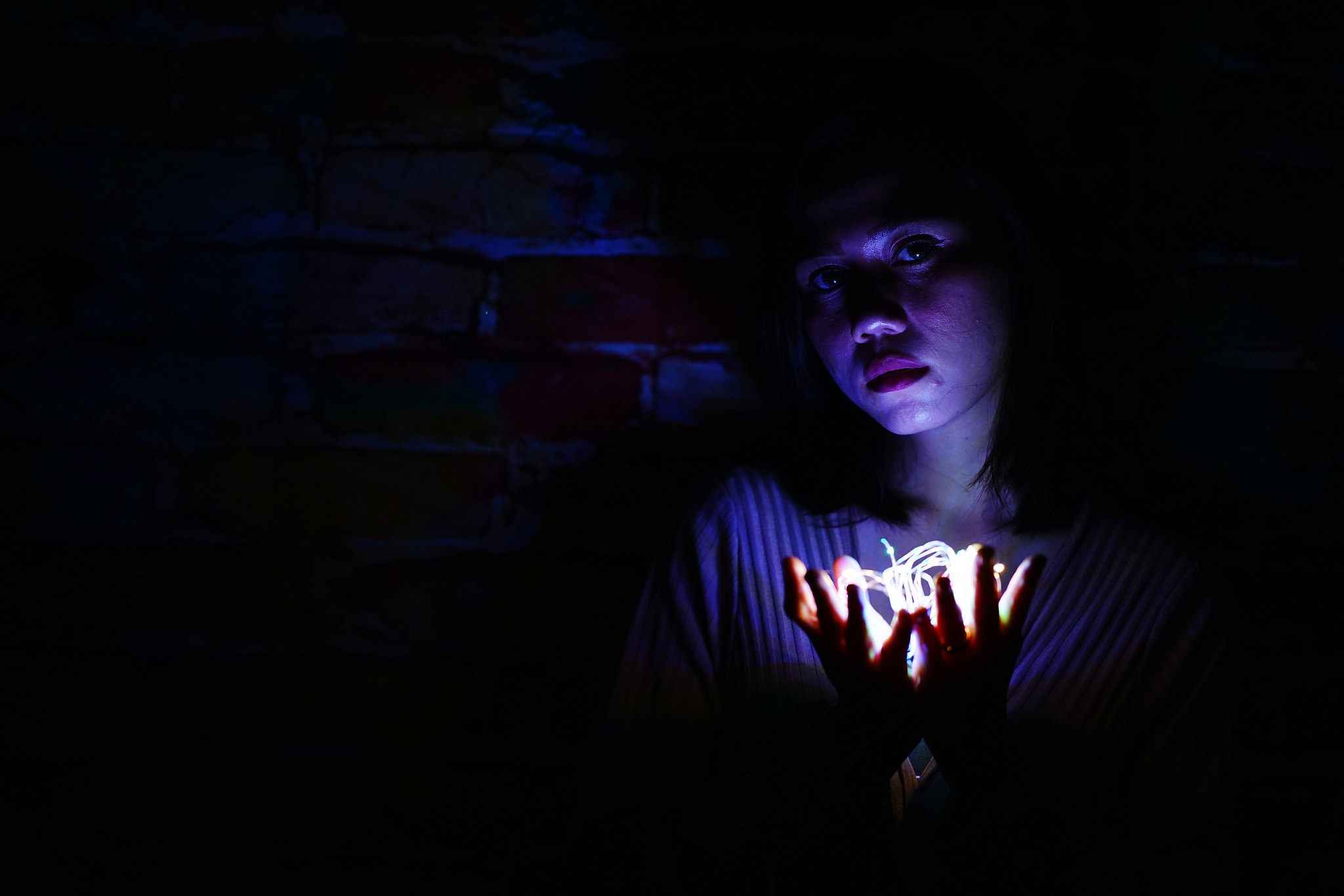portrait of senior woman in darkroom