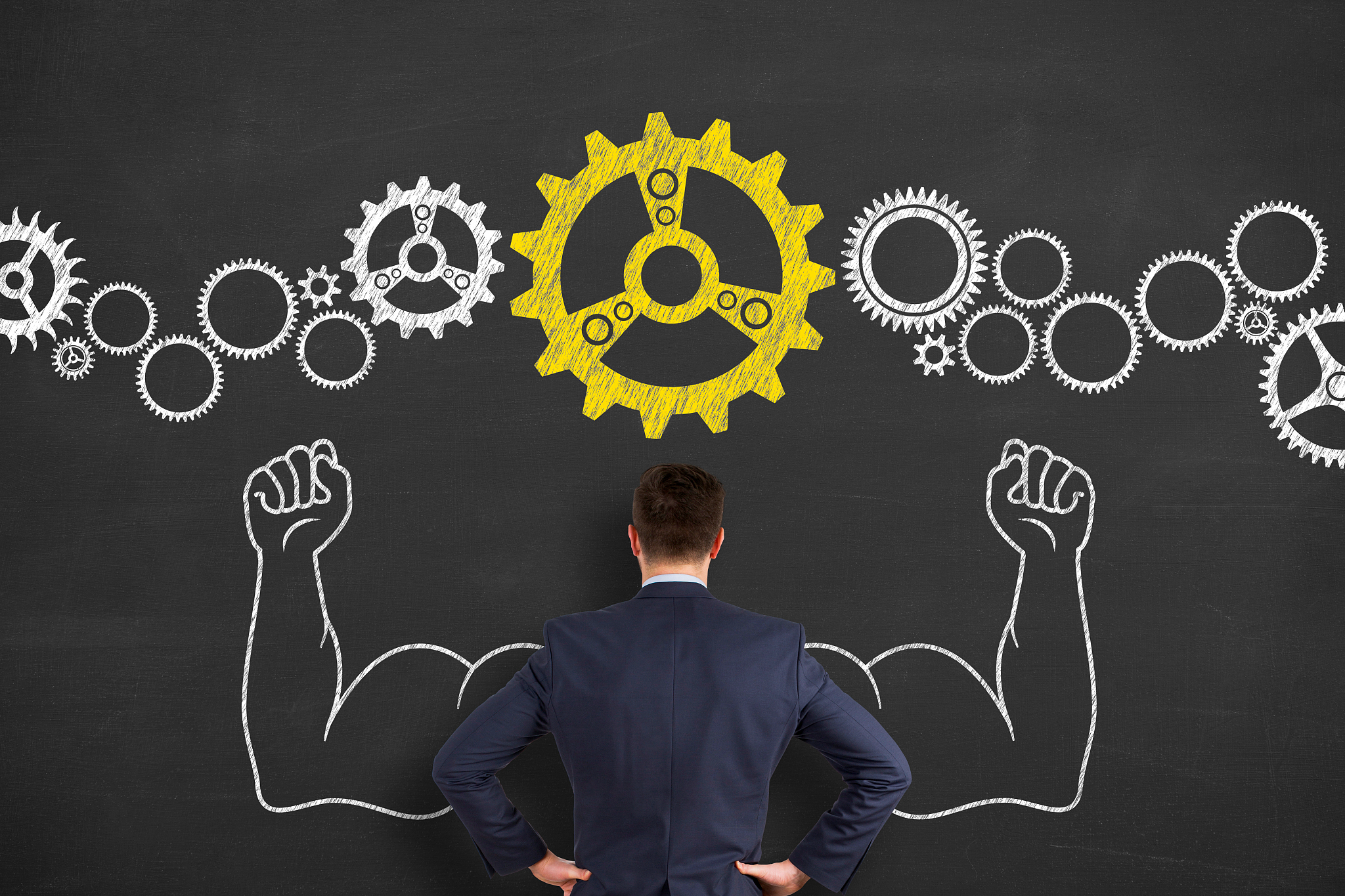solution concepts with gears on chalkboard background