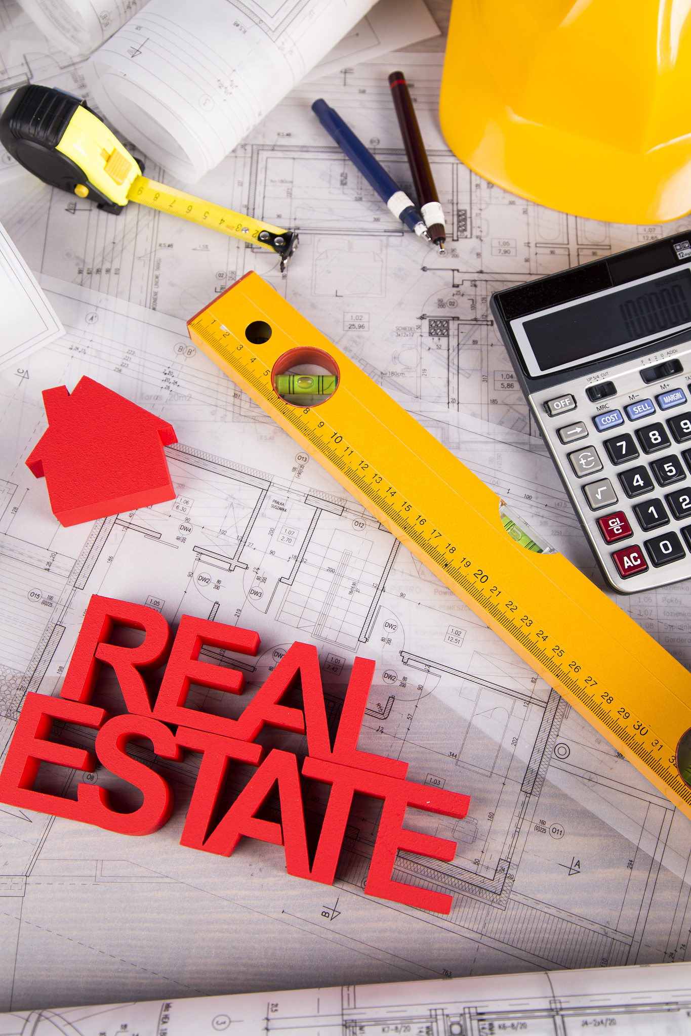 real estate agency concept and blueprints
