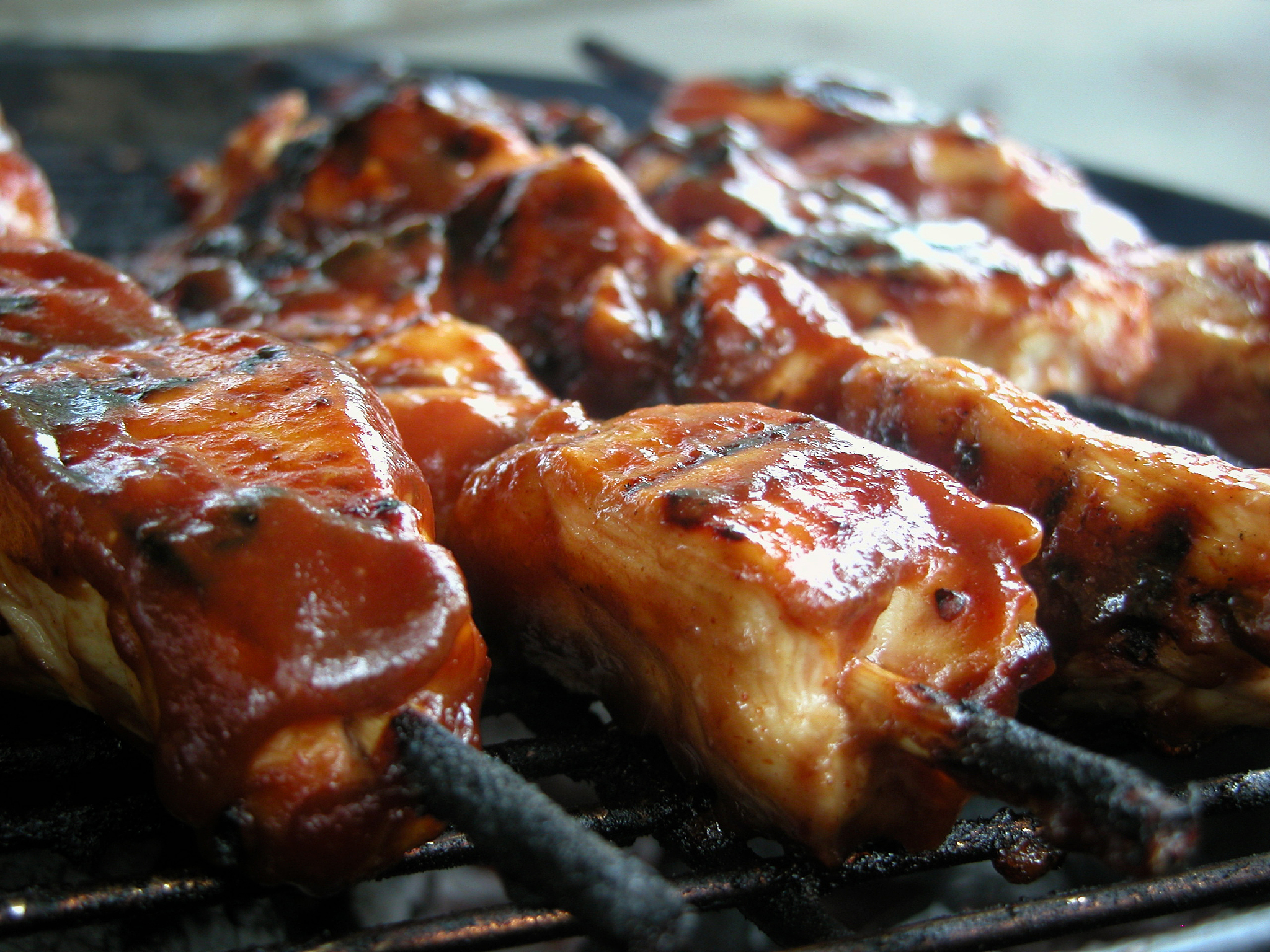marinated chicken kebabs on outdoor grill