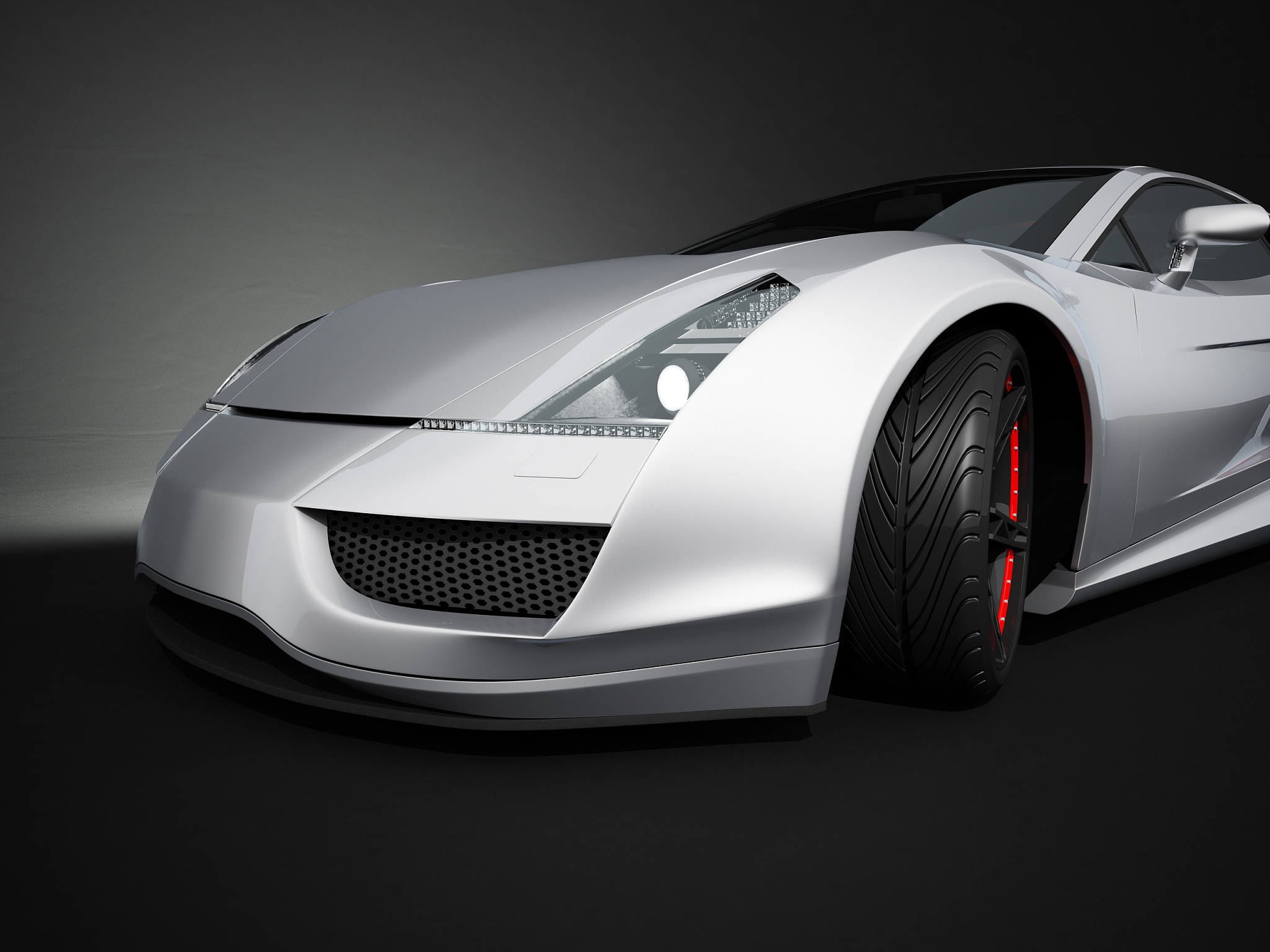 silver sport car on black studio background
