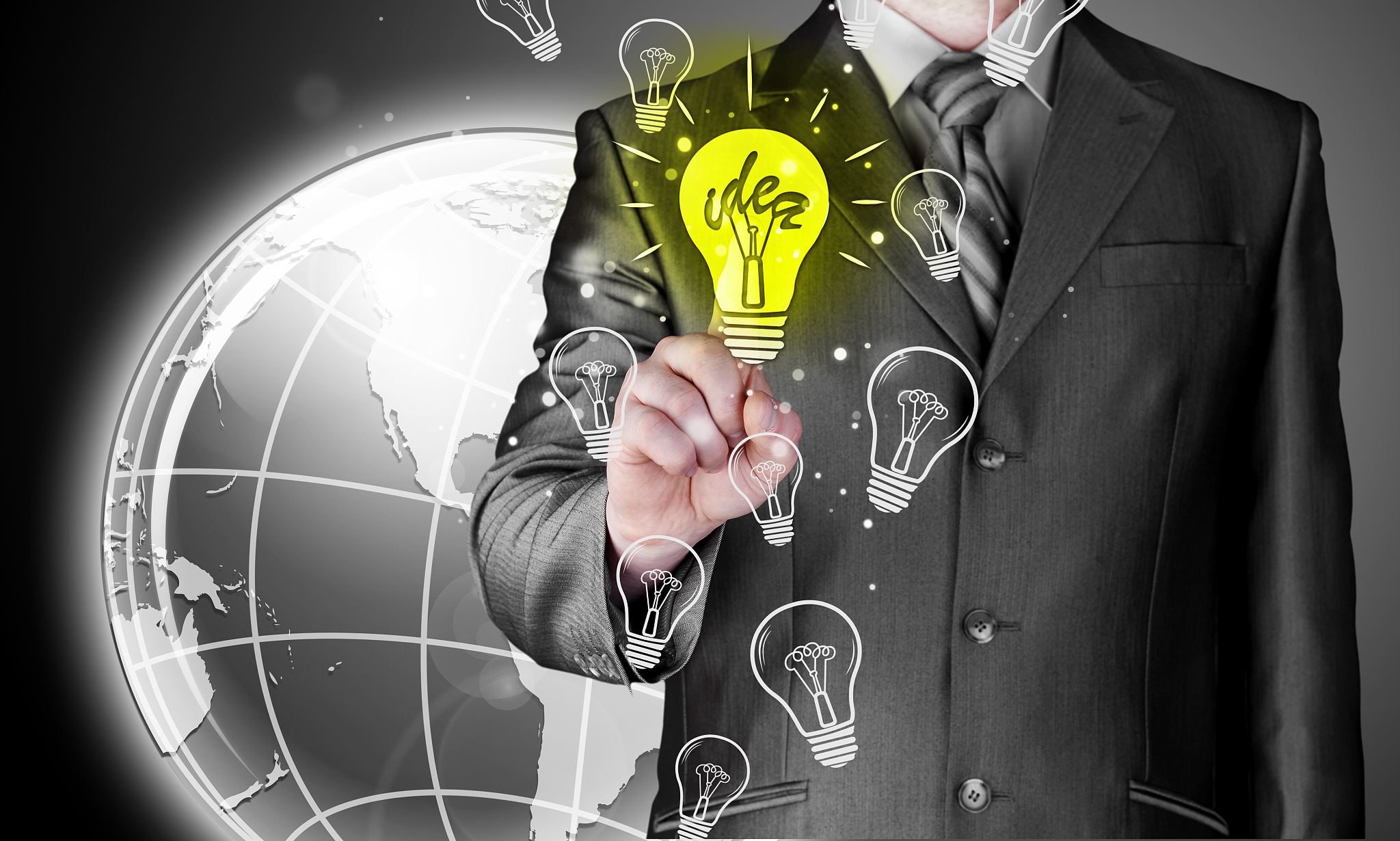 business man touching light of idea
