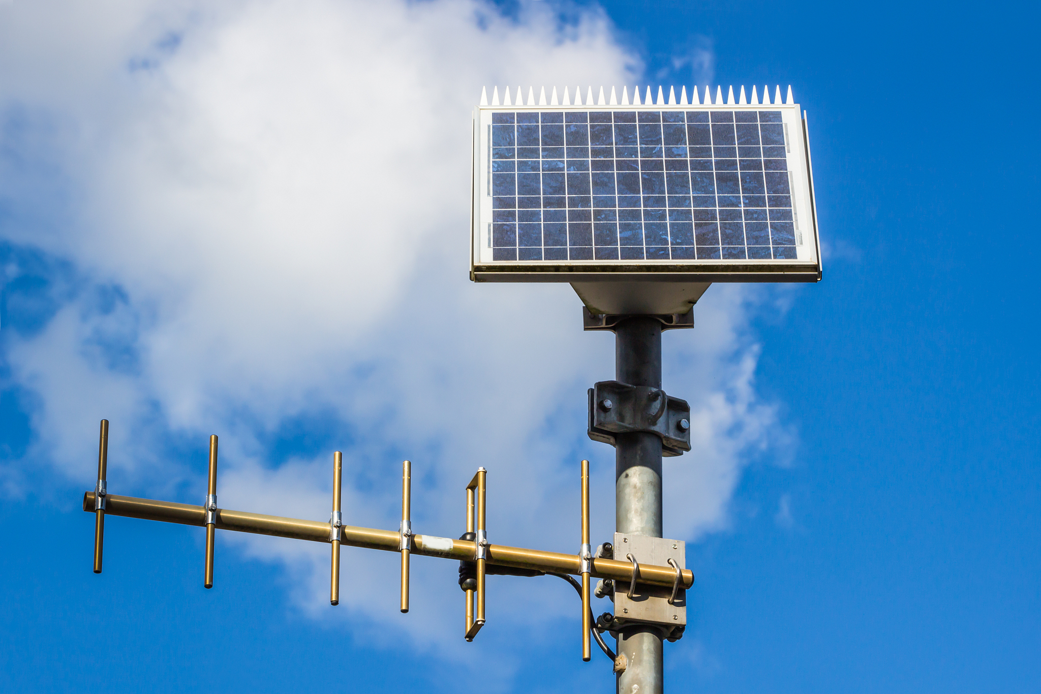small antenna booster with solar panel.