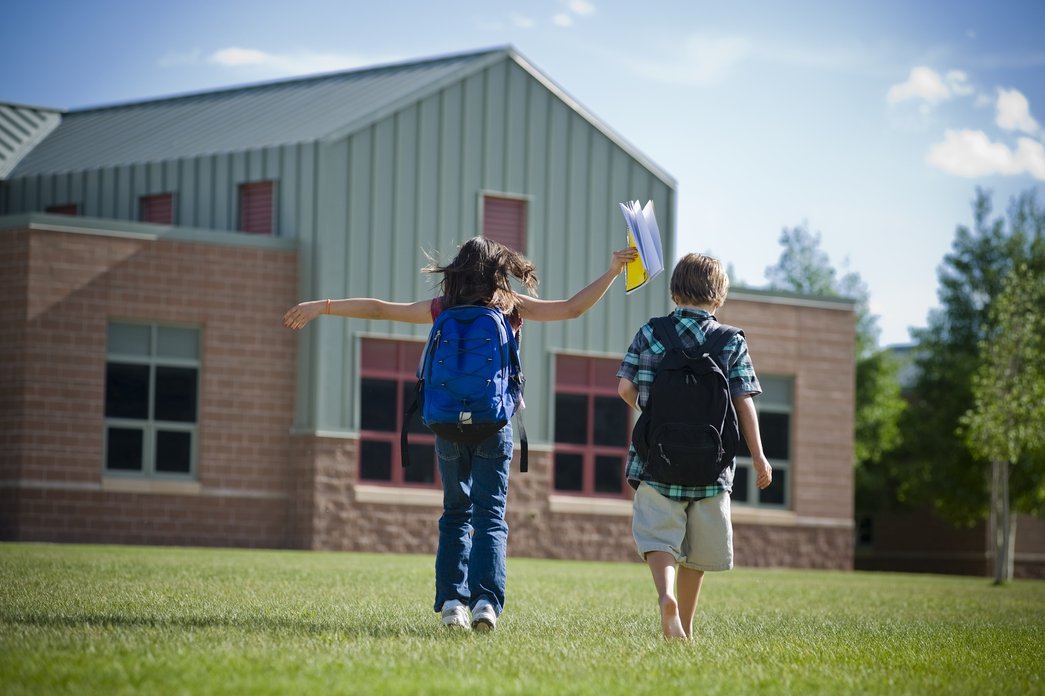 boy and girl happy for back to school