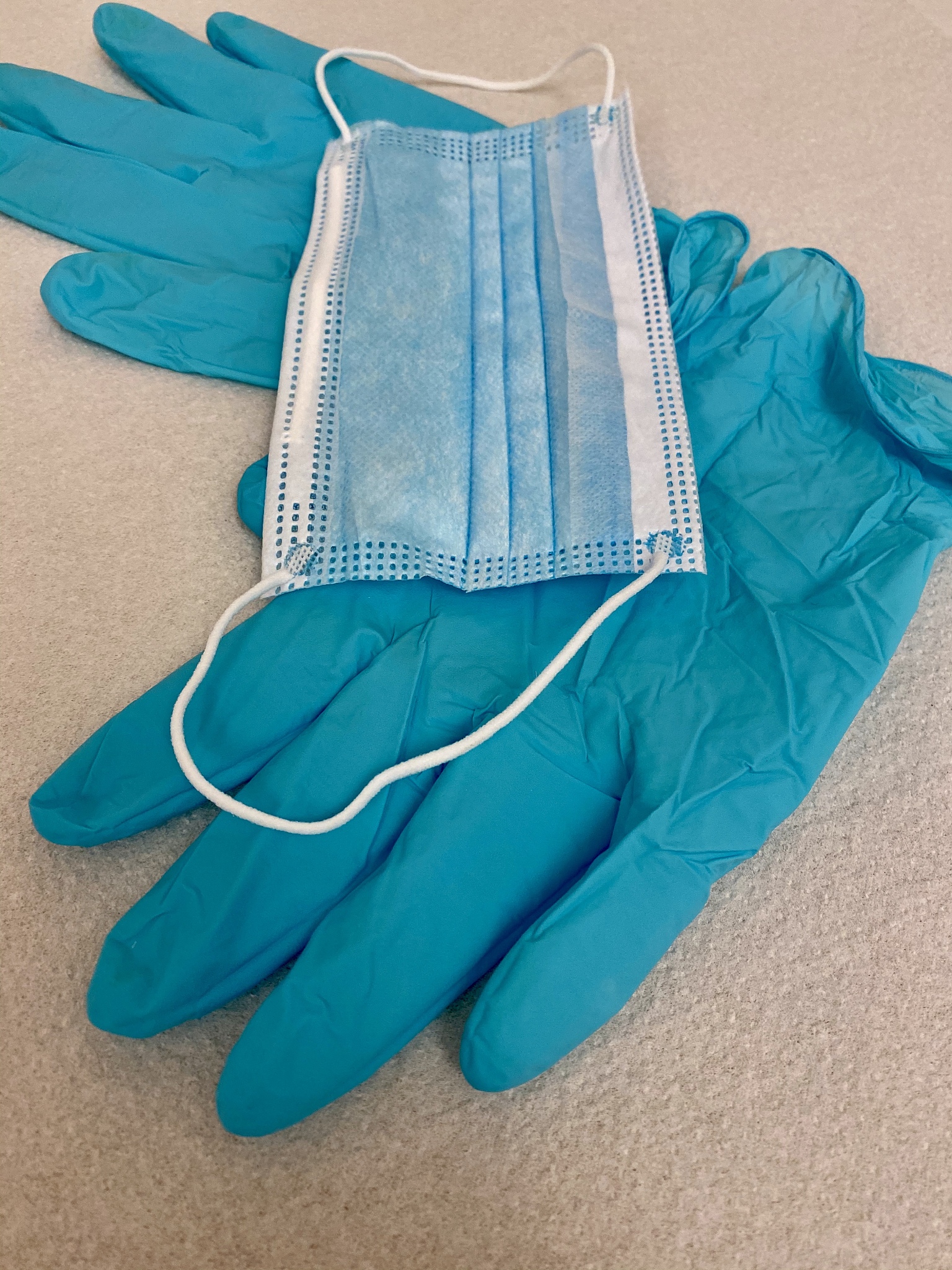 blue medical protective gloves, blue surgical face mask