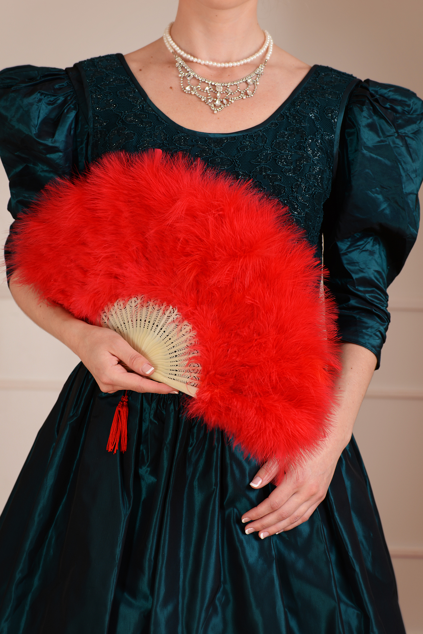 closeup victorian woman holding feather fan