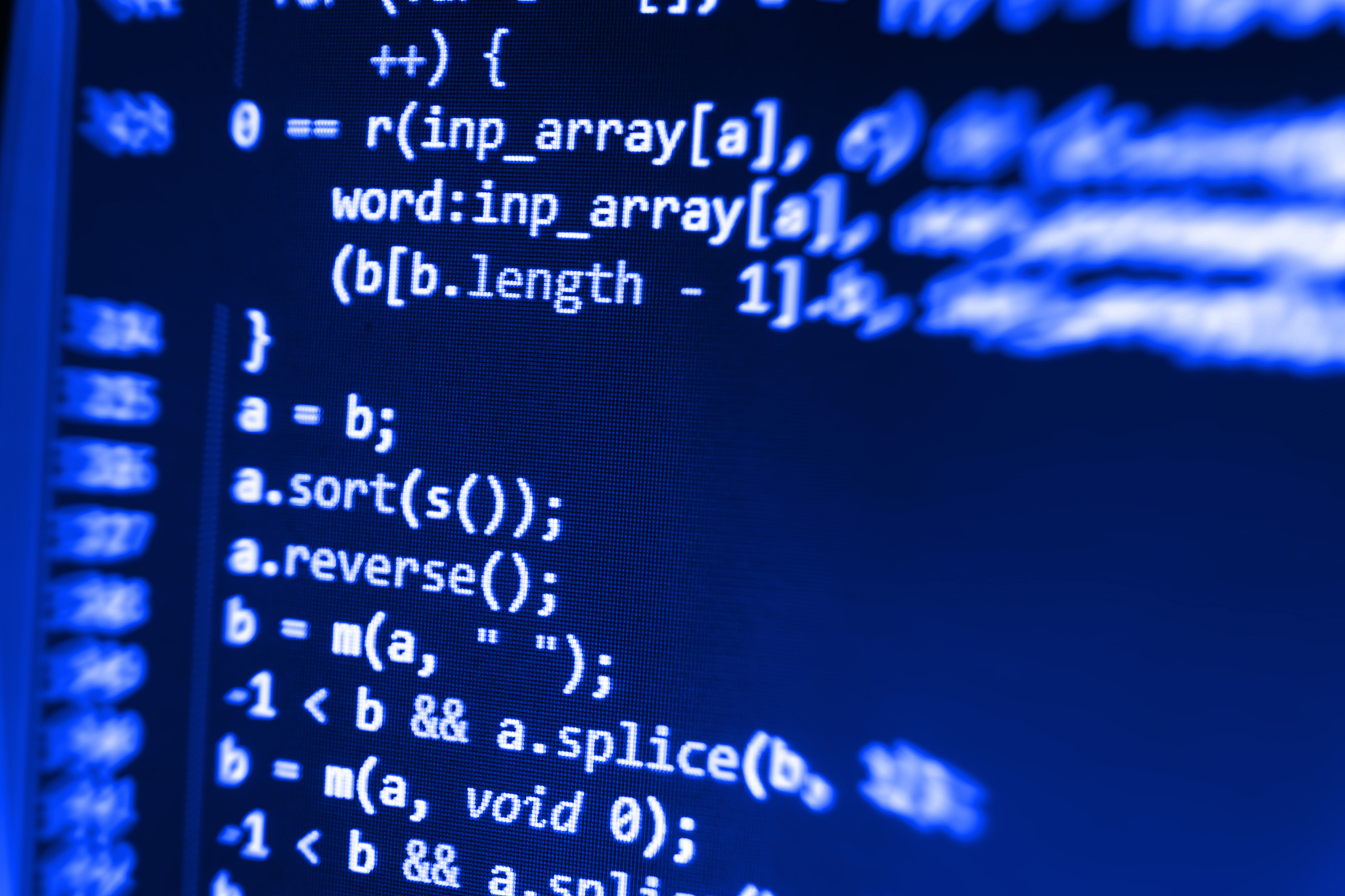 software developer programming code on computer