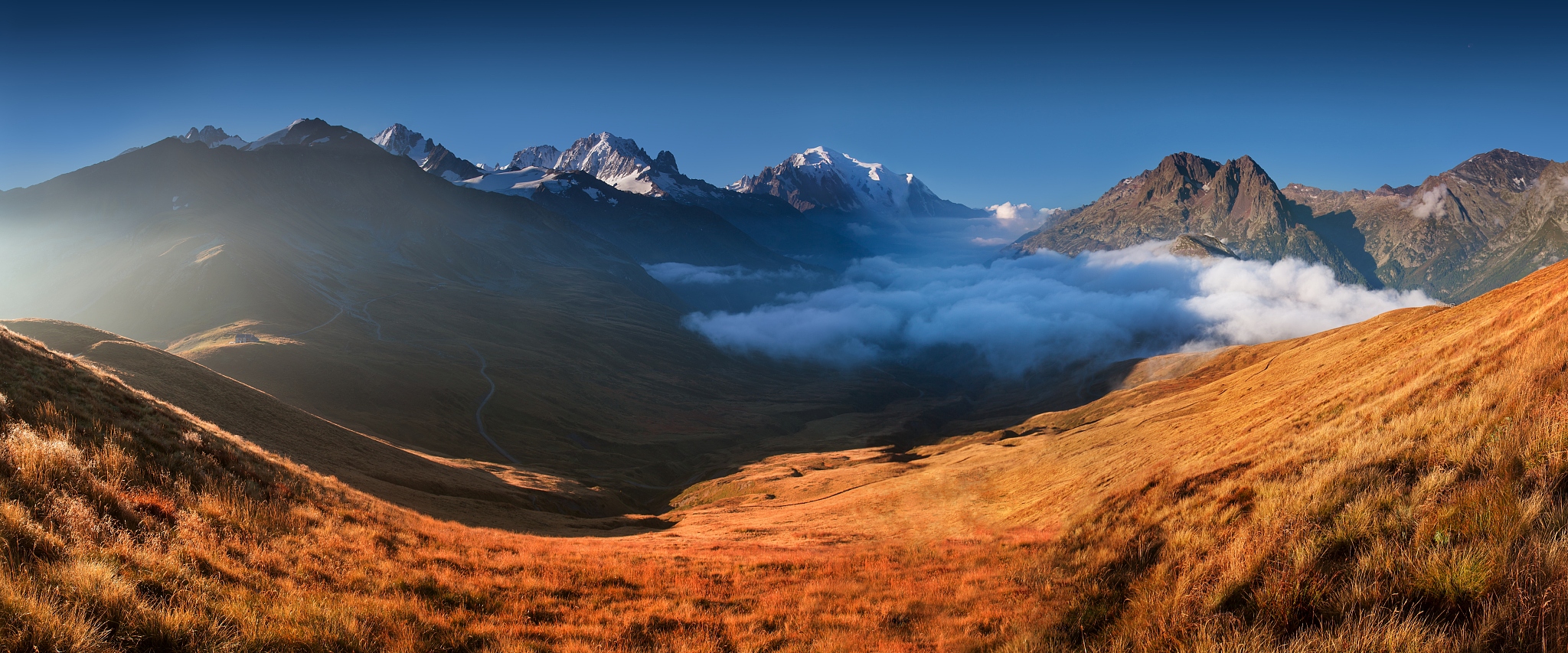 a panoramic view on chamonix valley from in summer starry night.
