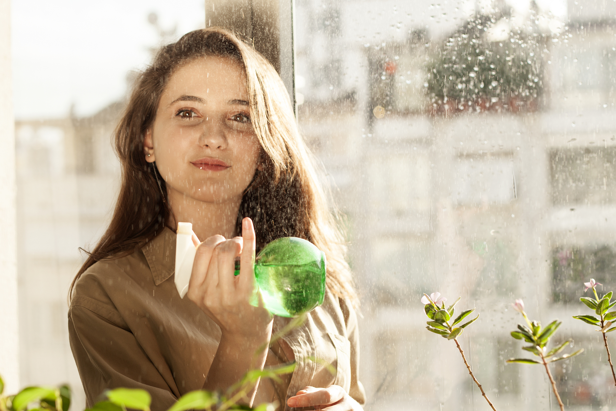 housewife with plants indoors