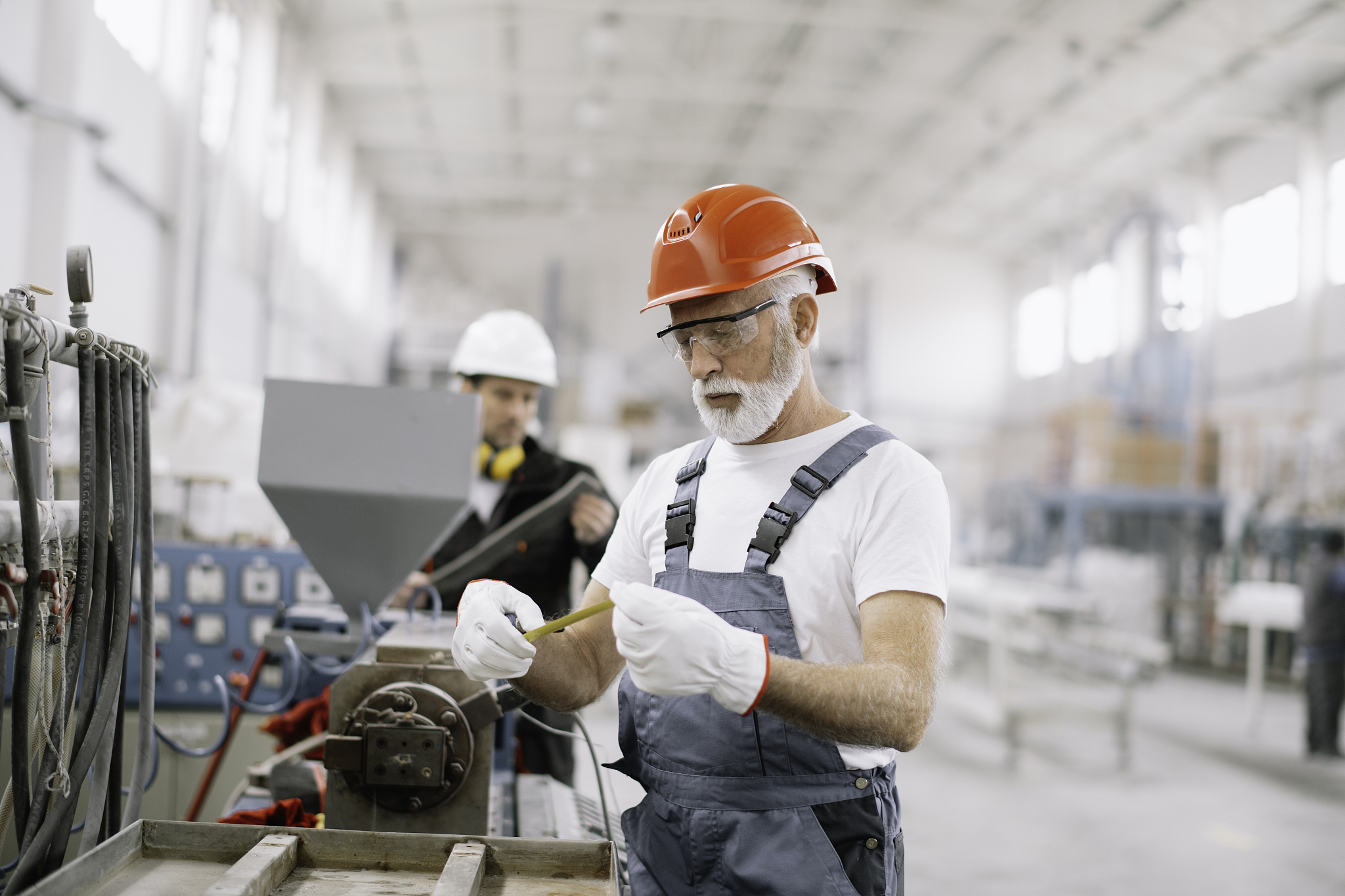 colleagues working together in factory