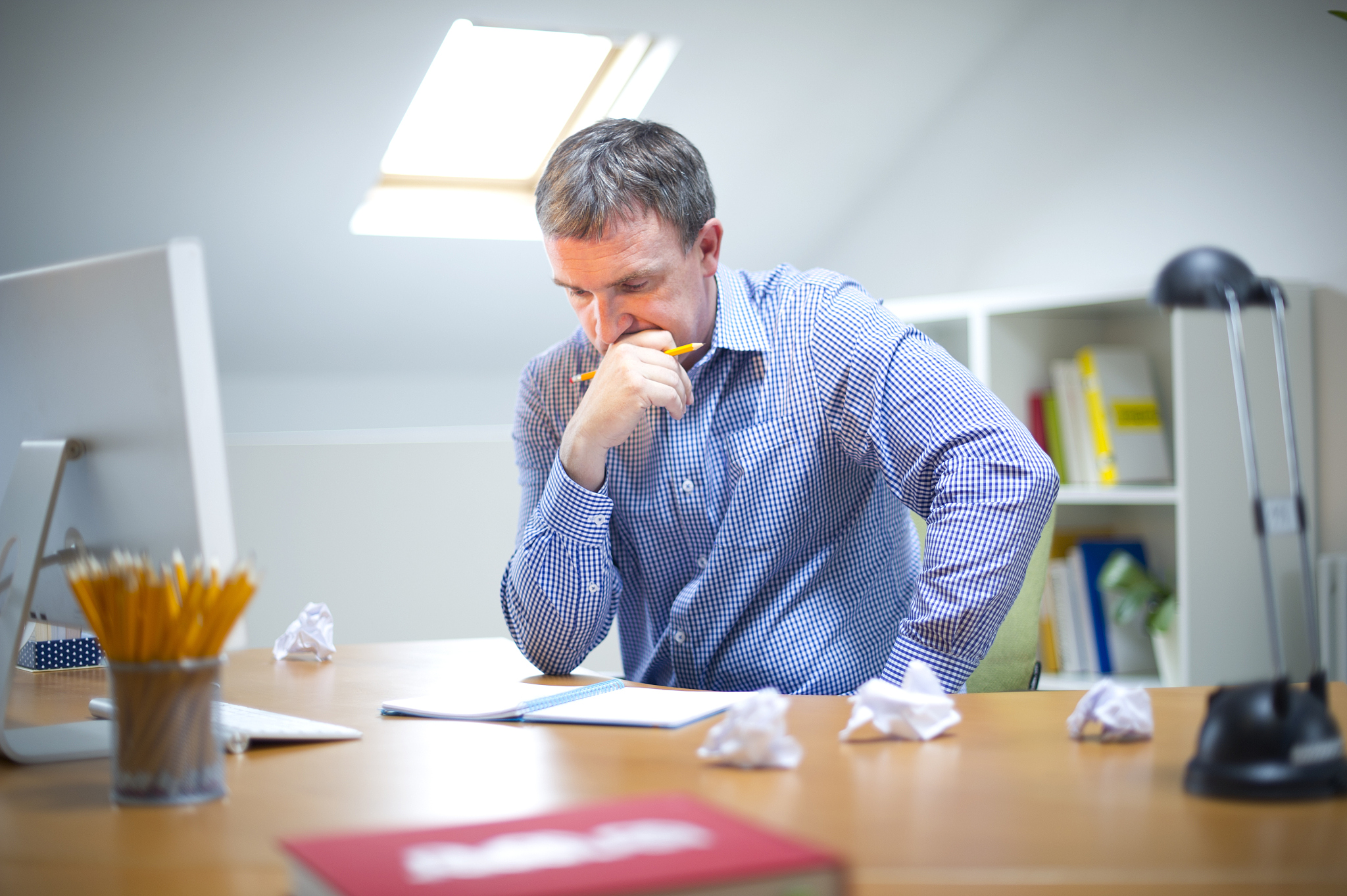 worried man at his desk