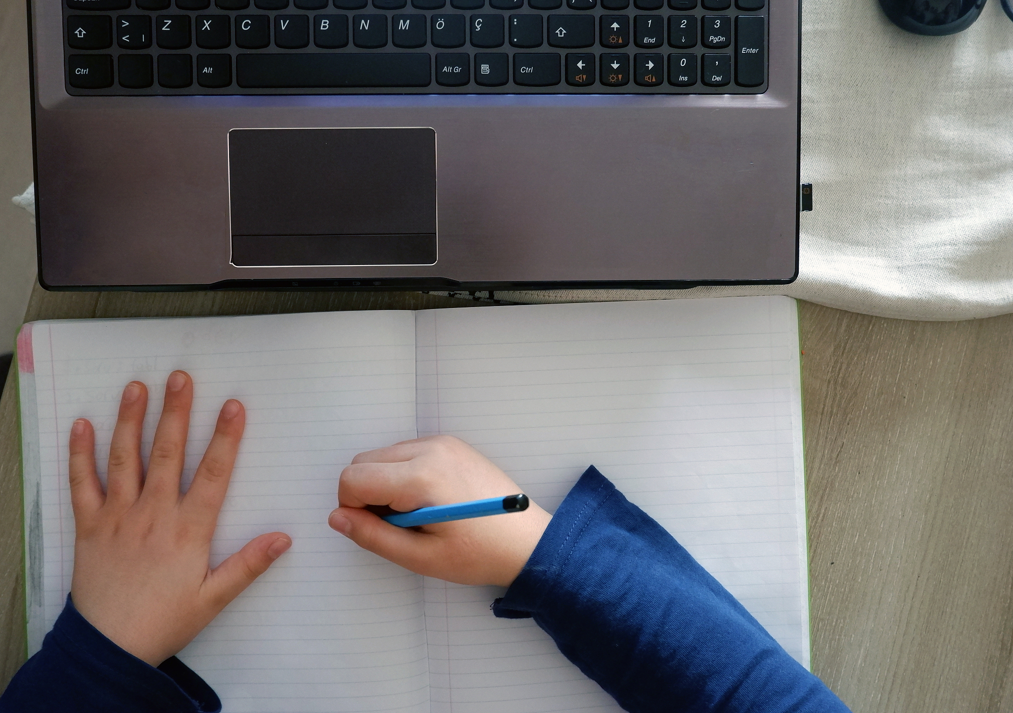 a nine-year-old caucasian turkish boy, studying at home with onl