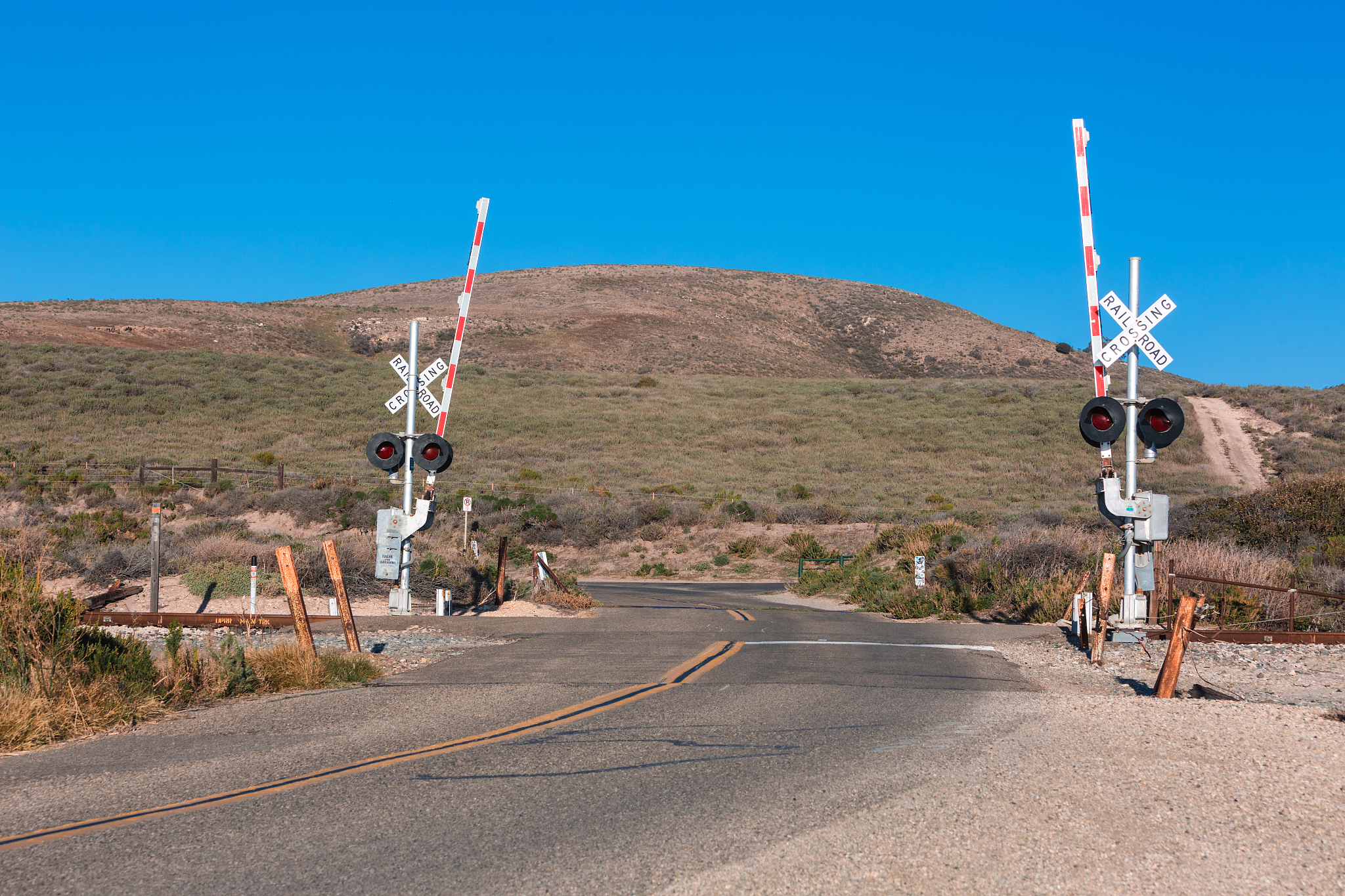 railroad crossing in the middle of nowhere