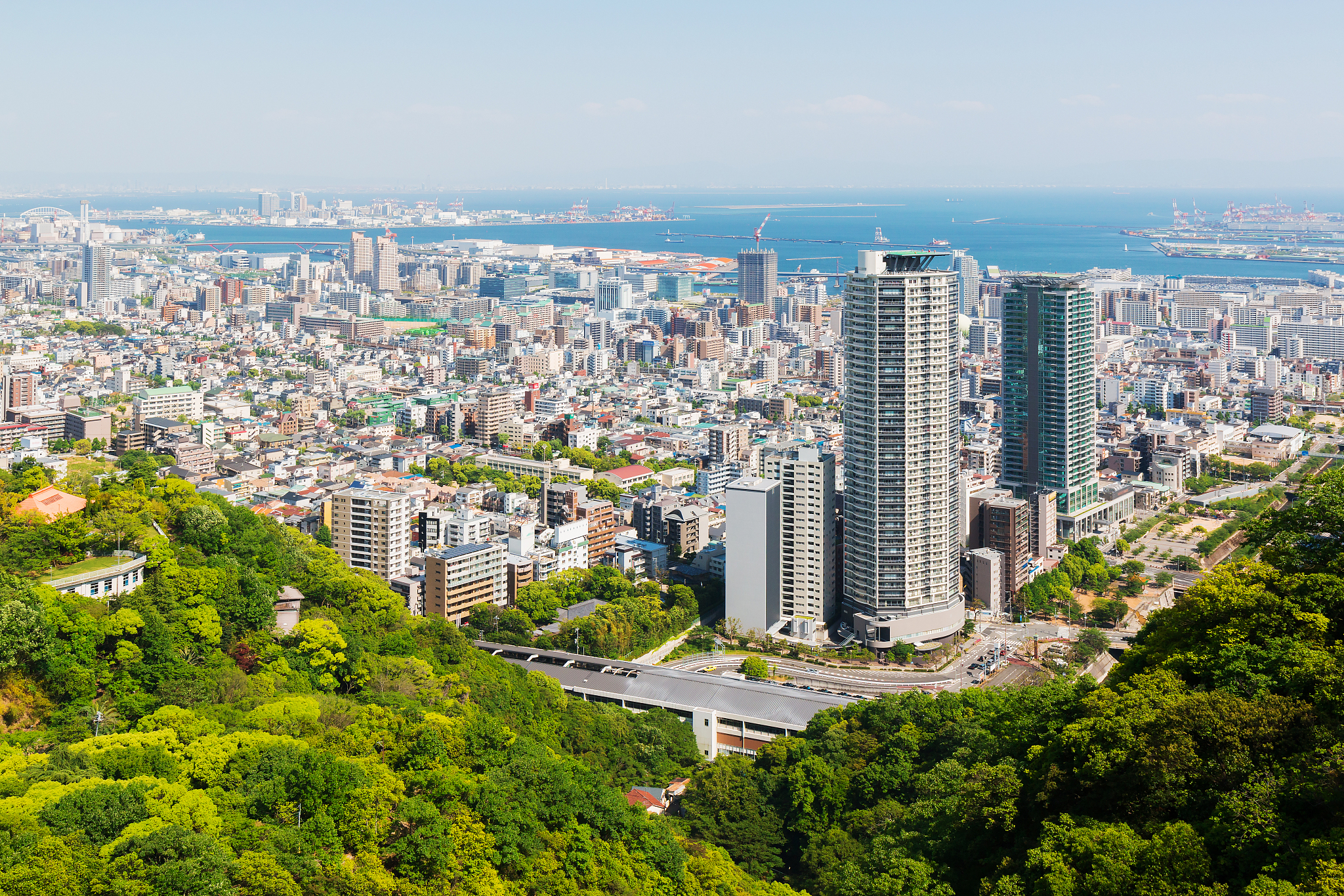 kobe cityscape and skyline with port view from mountain.