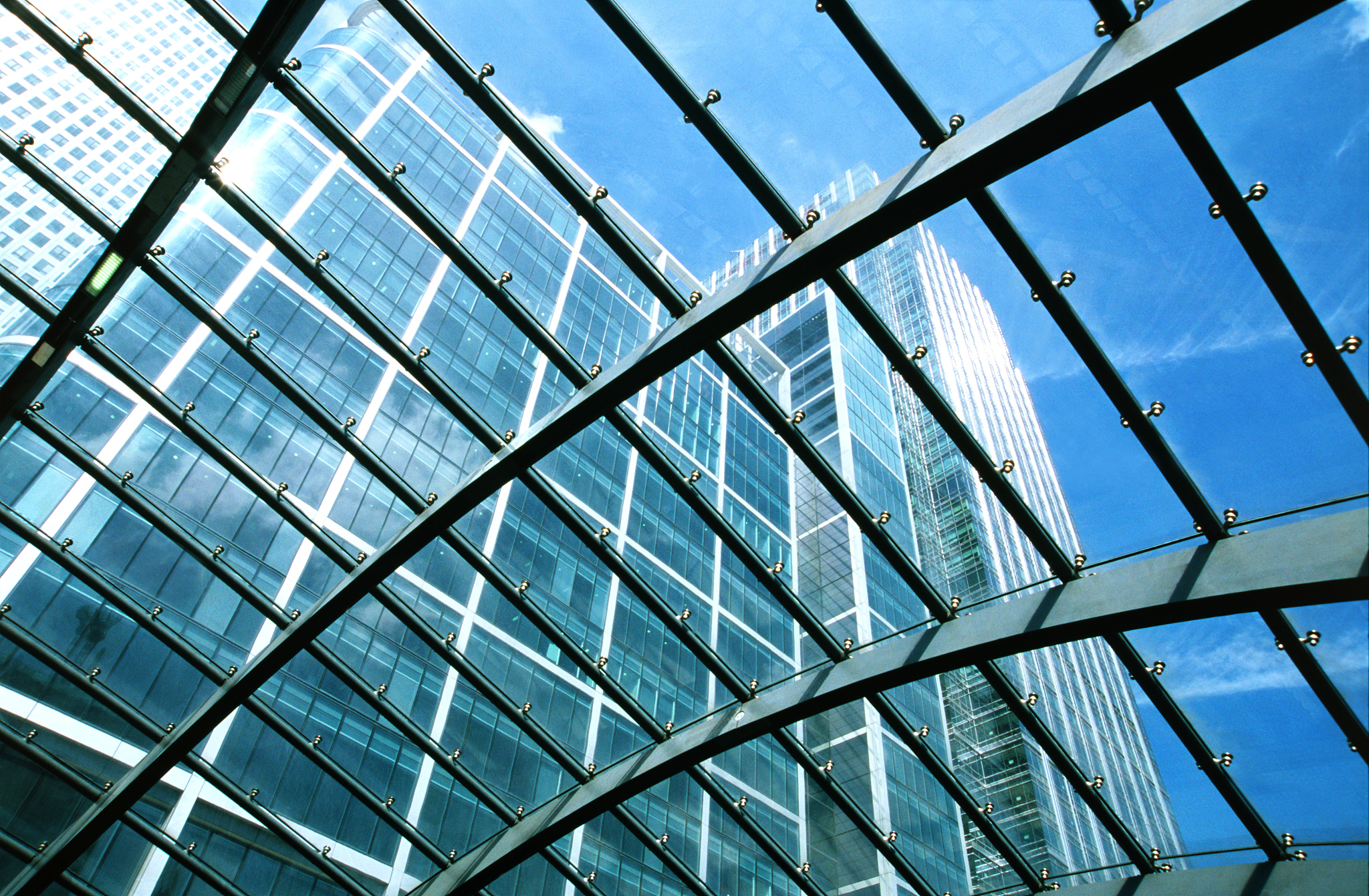 close-up of metal grid work on a glass ceiling