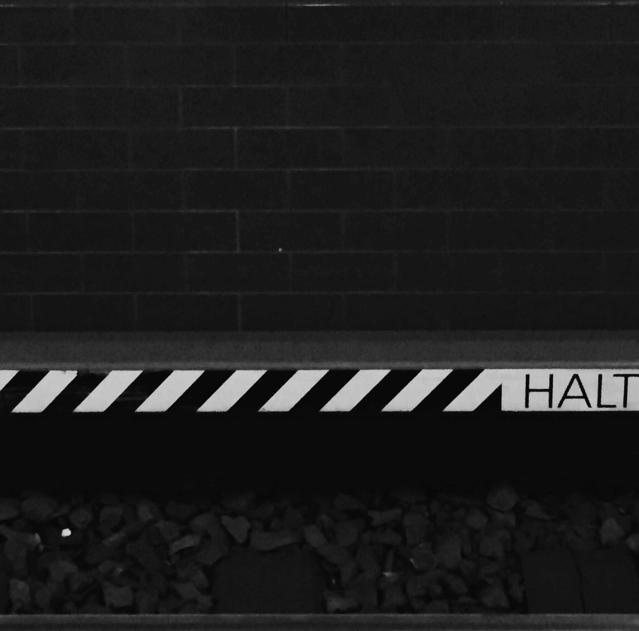 warning sign at subway station