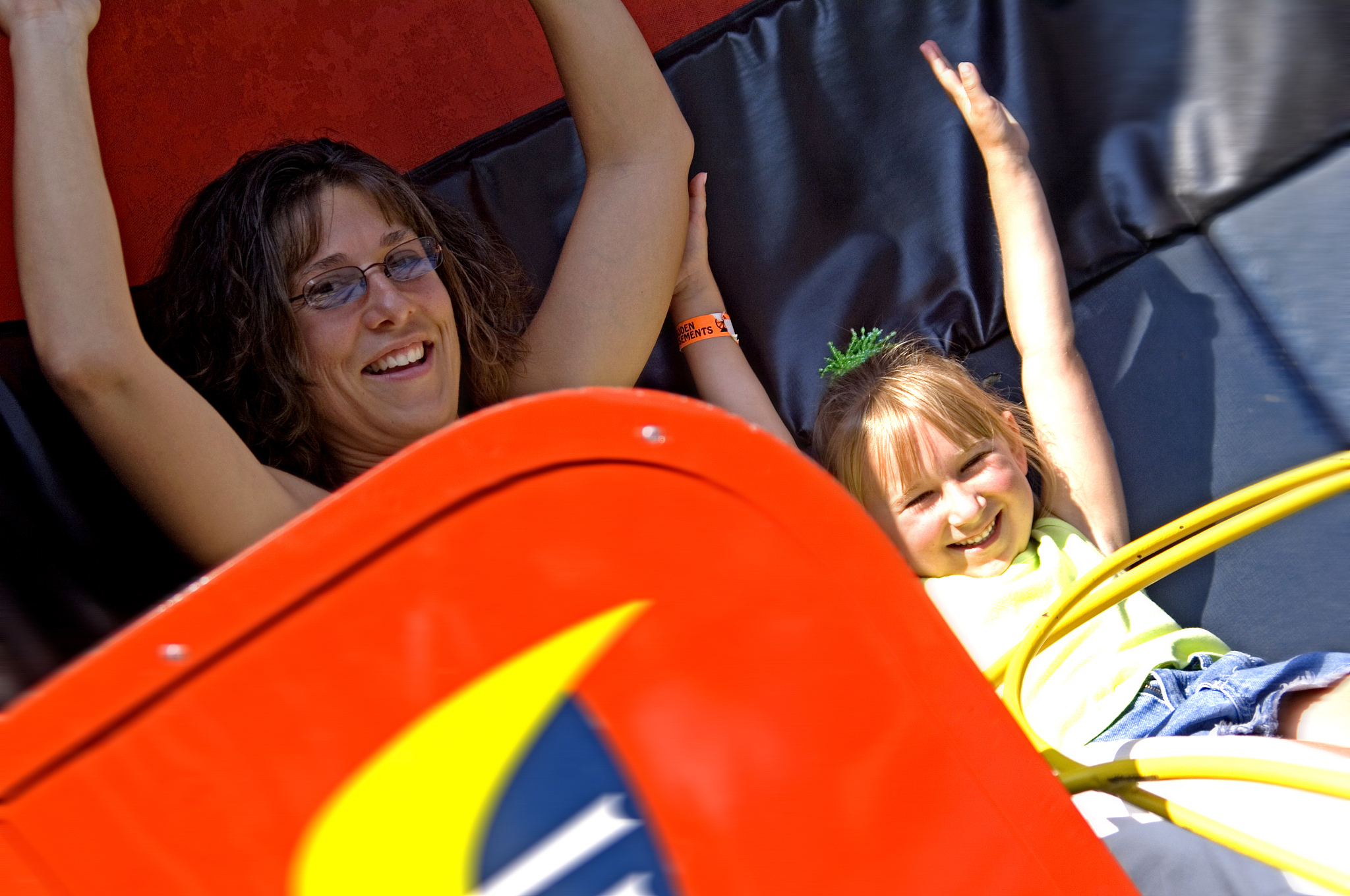 mother and daughter on carnival ride