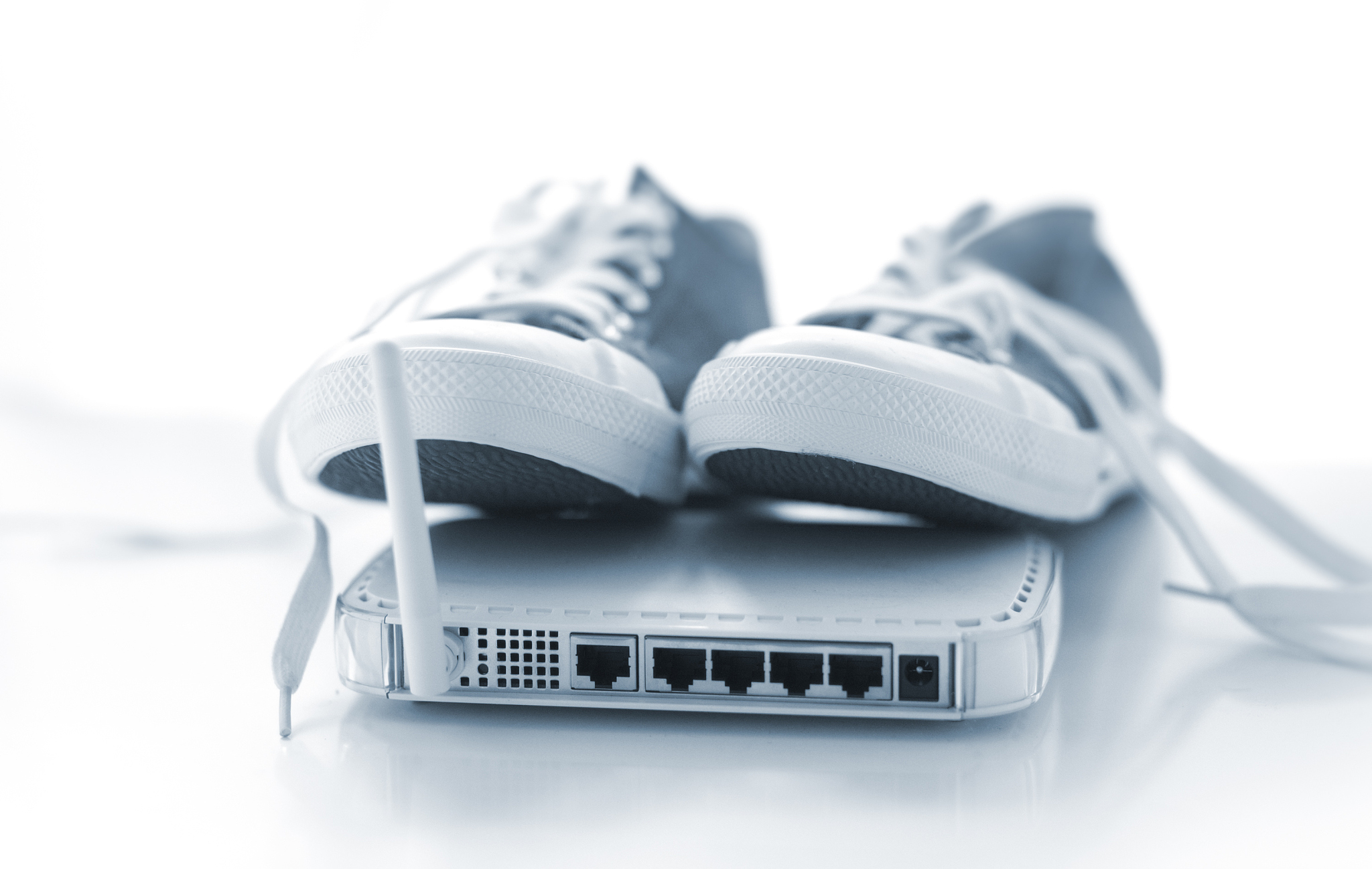 sneakers of a wireless router on white