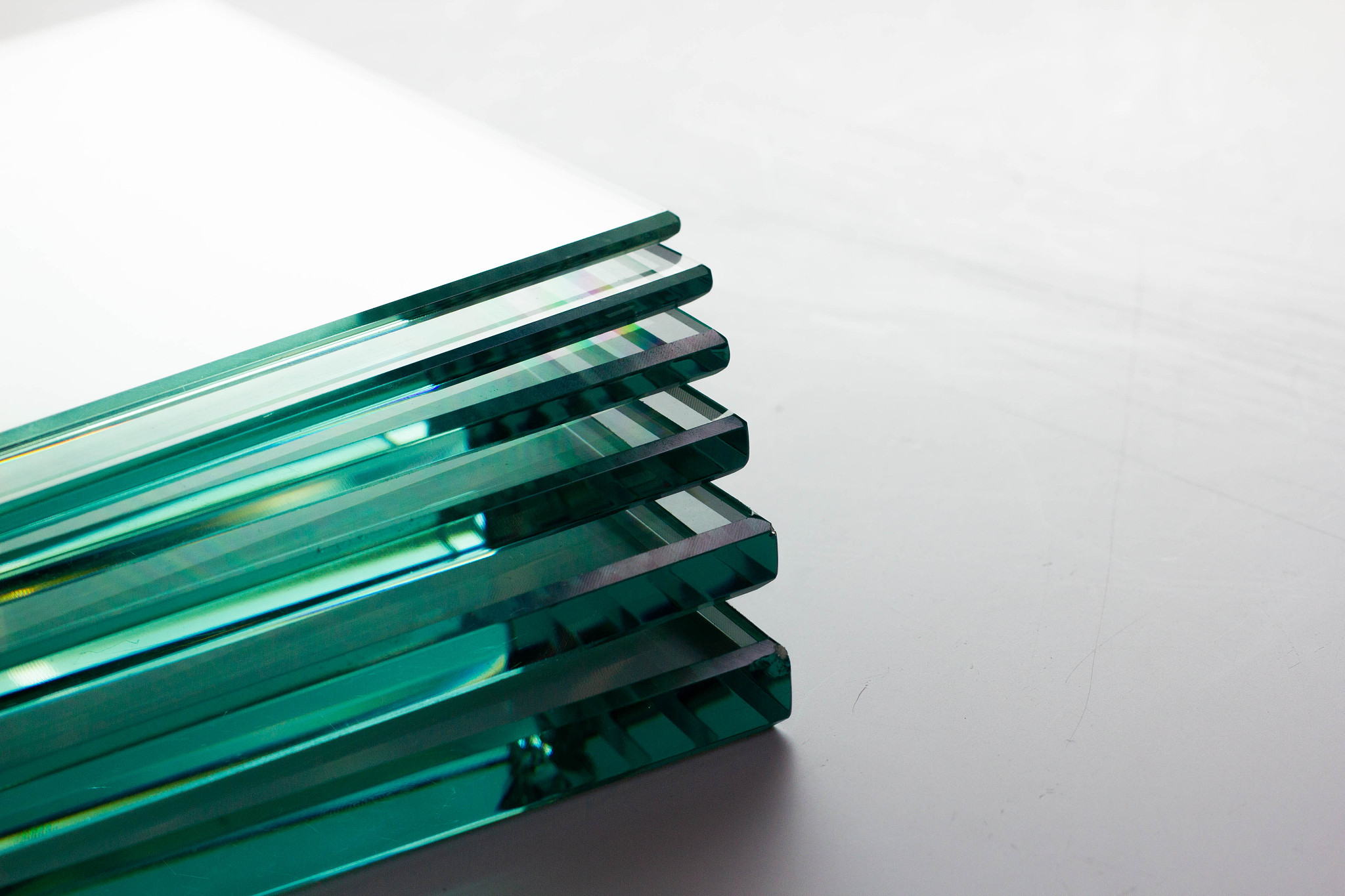 glass factories produce glass used in buildings and homes. there