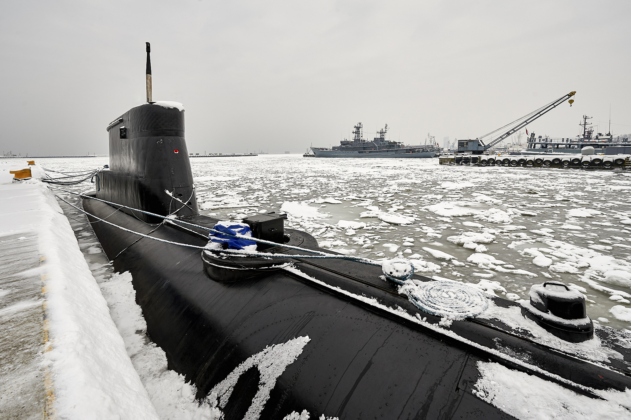 small submarine in the winter port