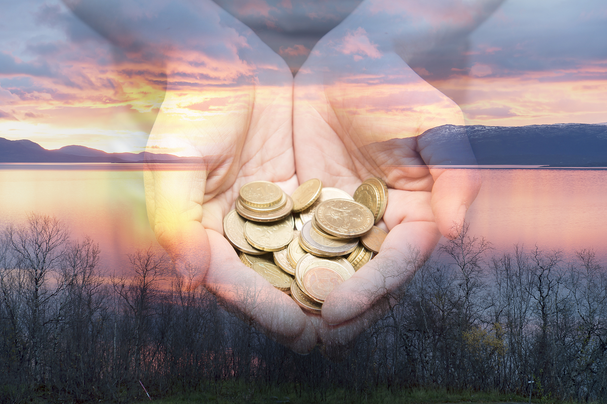 double exposure of mountains and lakes, with coins in hands.