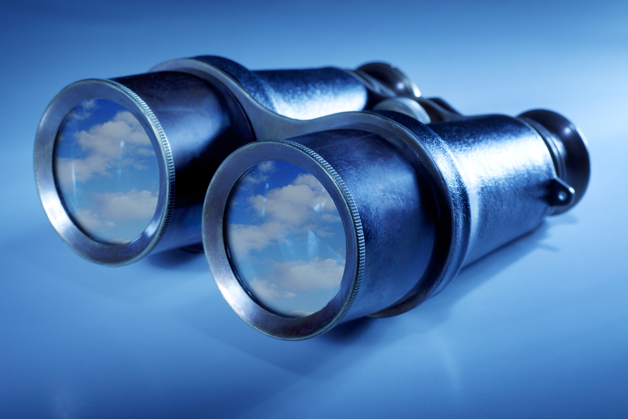 binoculars with clouds