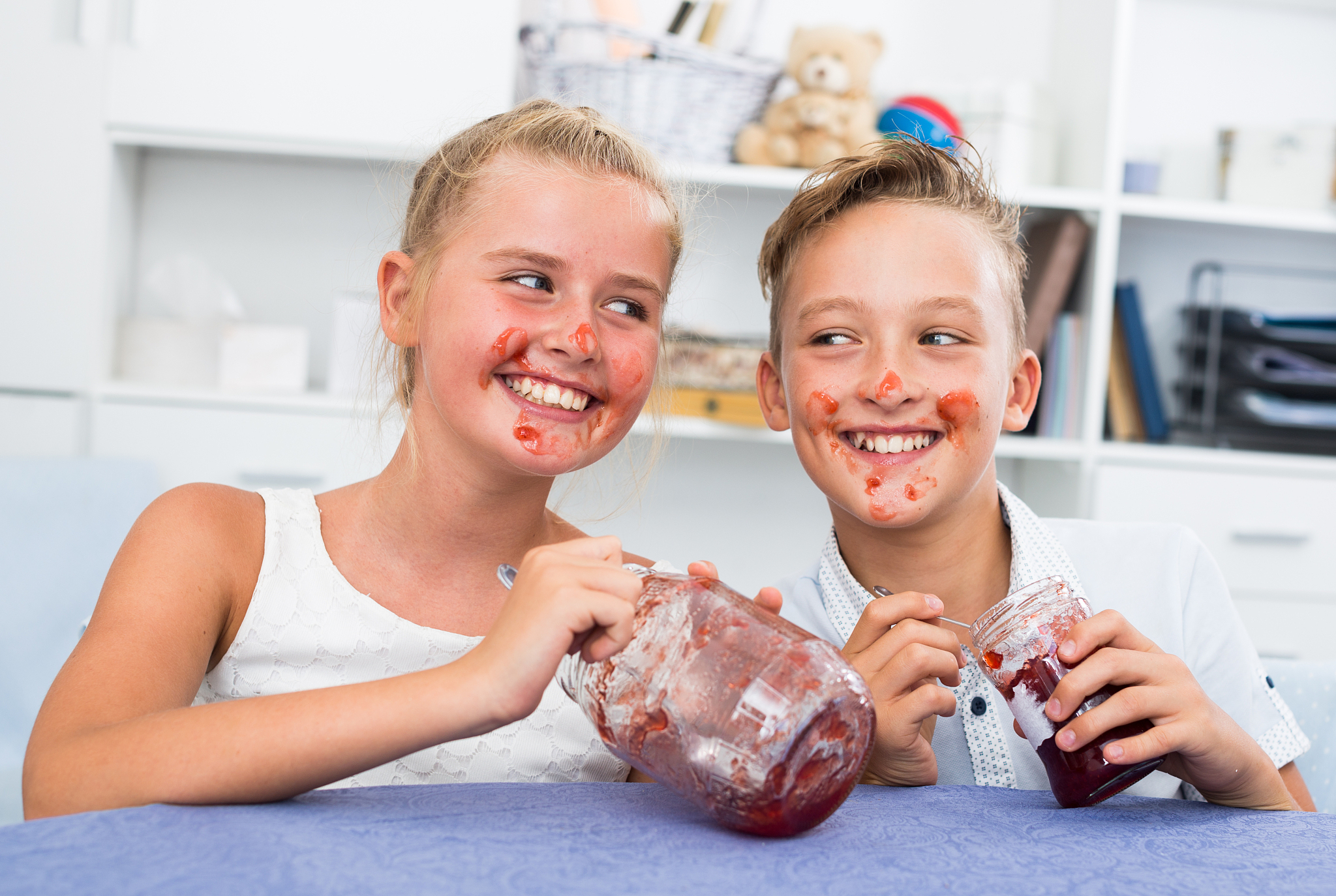 friends are having lunch time and eating jam