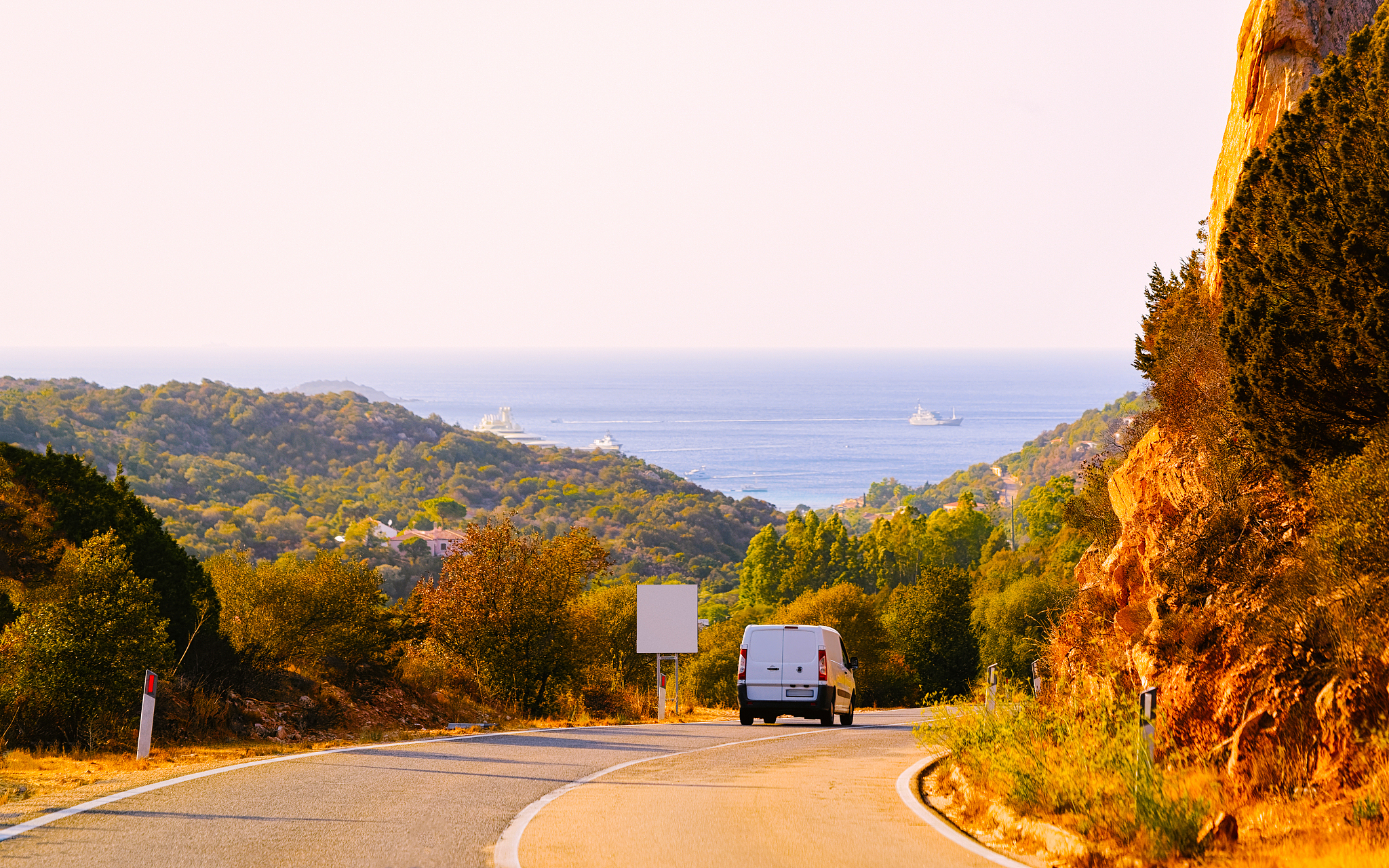 mini van on road in street in costa smeralda