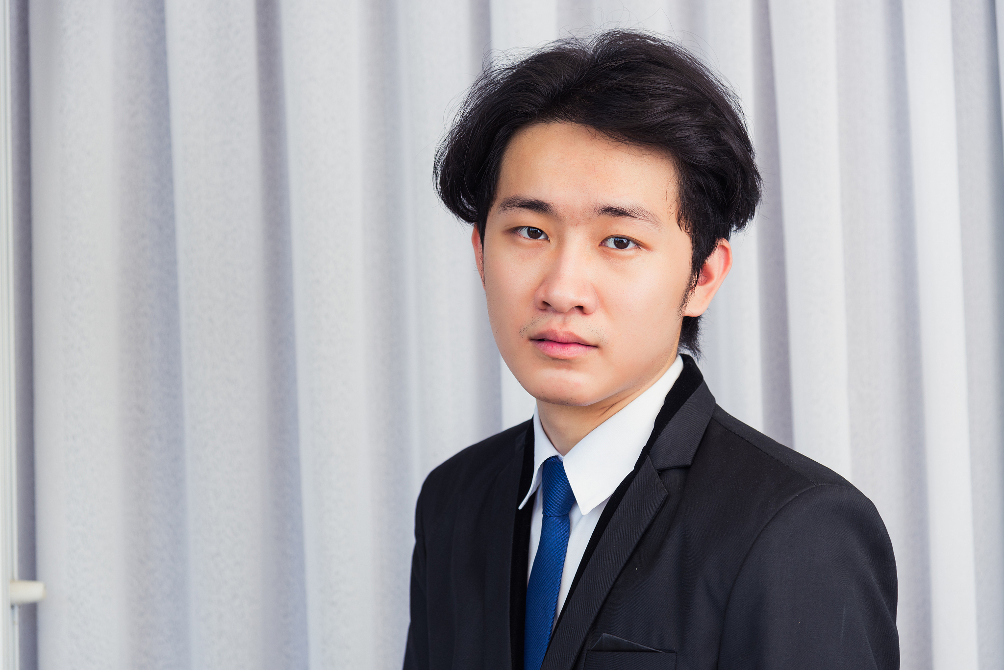 business man laughing confident mature standing in suit smiling