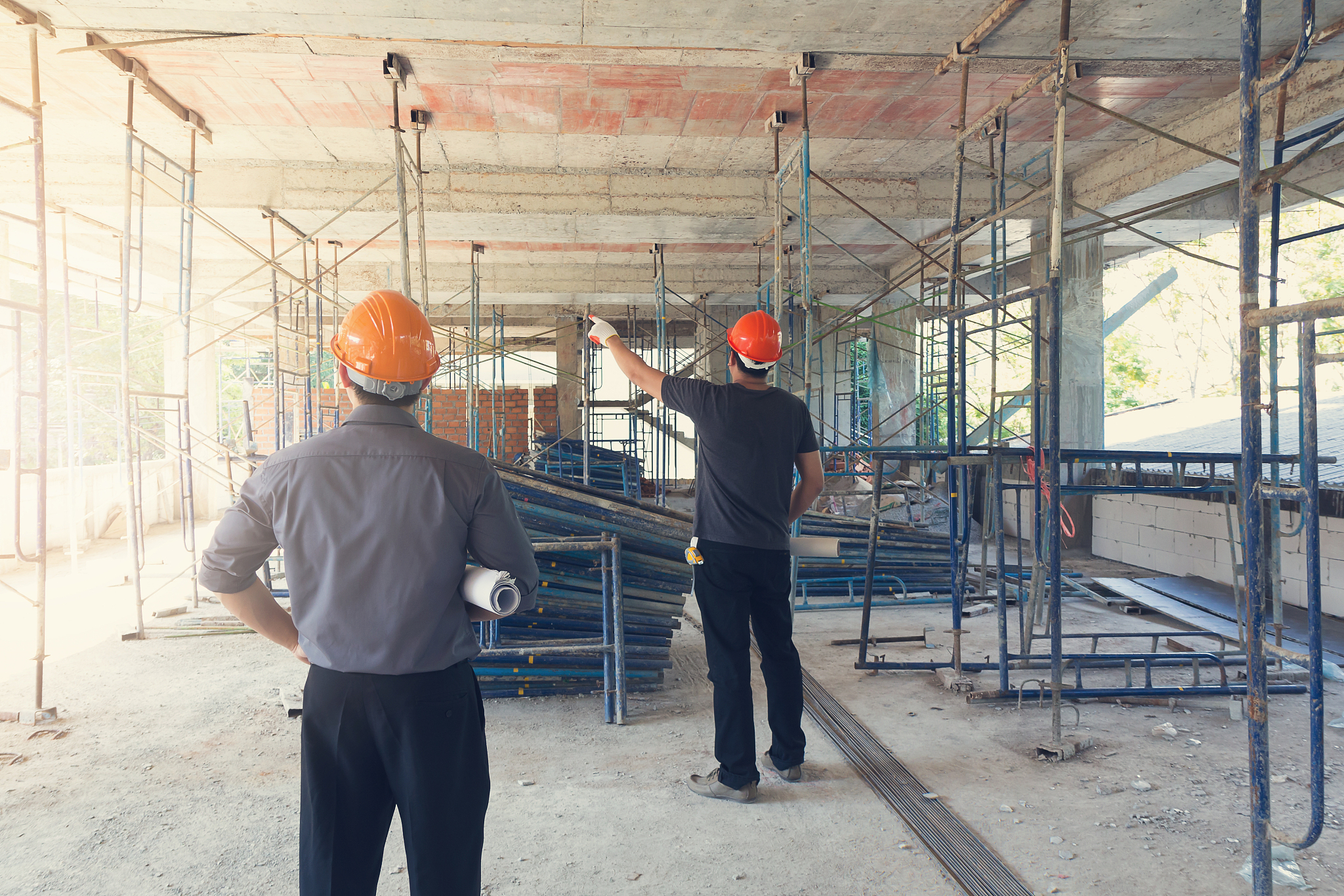 construction concepts, engineer and architect working at constru